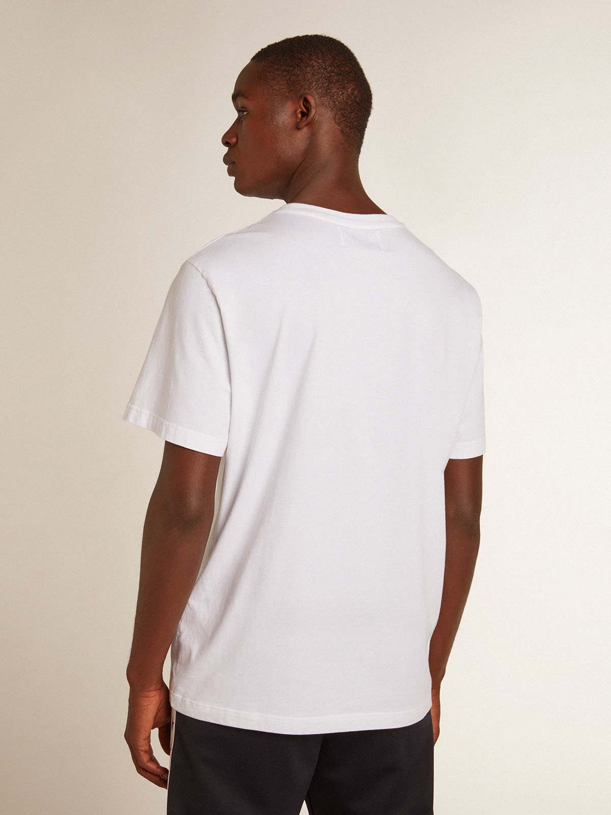 Men's white T-shirt with dark blue star on the front