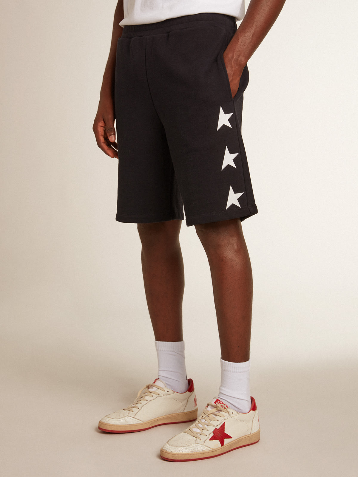 Golden Goose - Men’s black Bermuda shorts with contrasting white stars in 