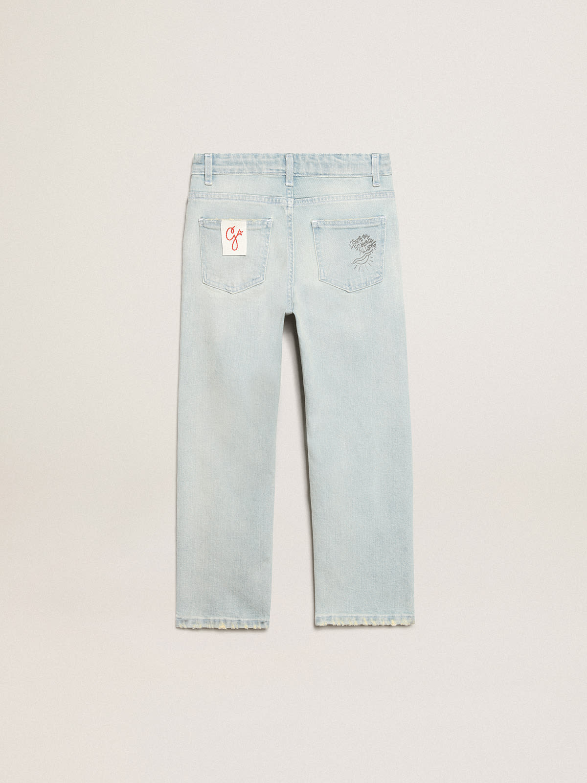 Boys’ bleached jeans with distressed treatment