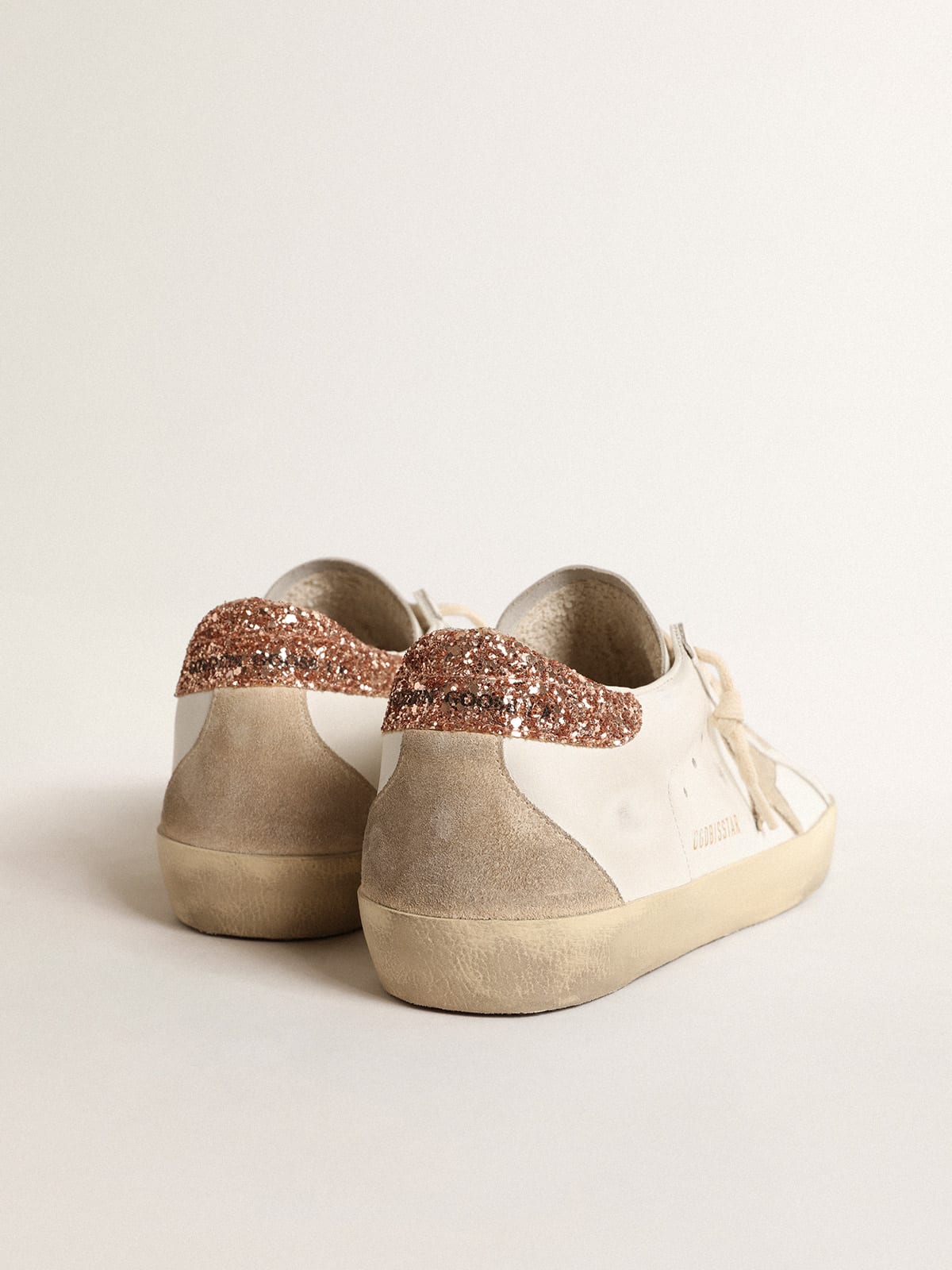 Golden Goose - Women's Super-Star with a suede star and peach-pink glitter heel tab in 