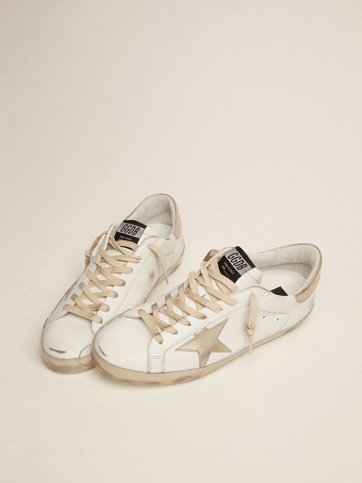 Golden Goose - Super-Star masculino com reforço dourado brilhante e inscrições in 