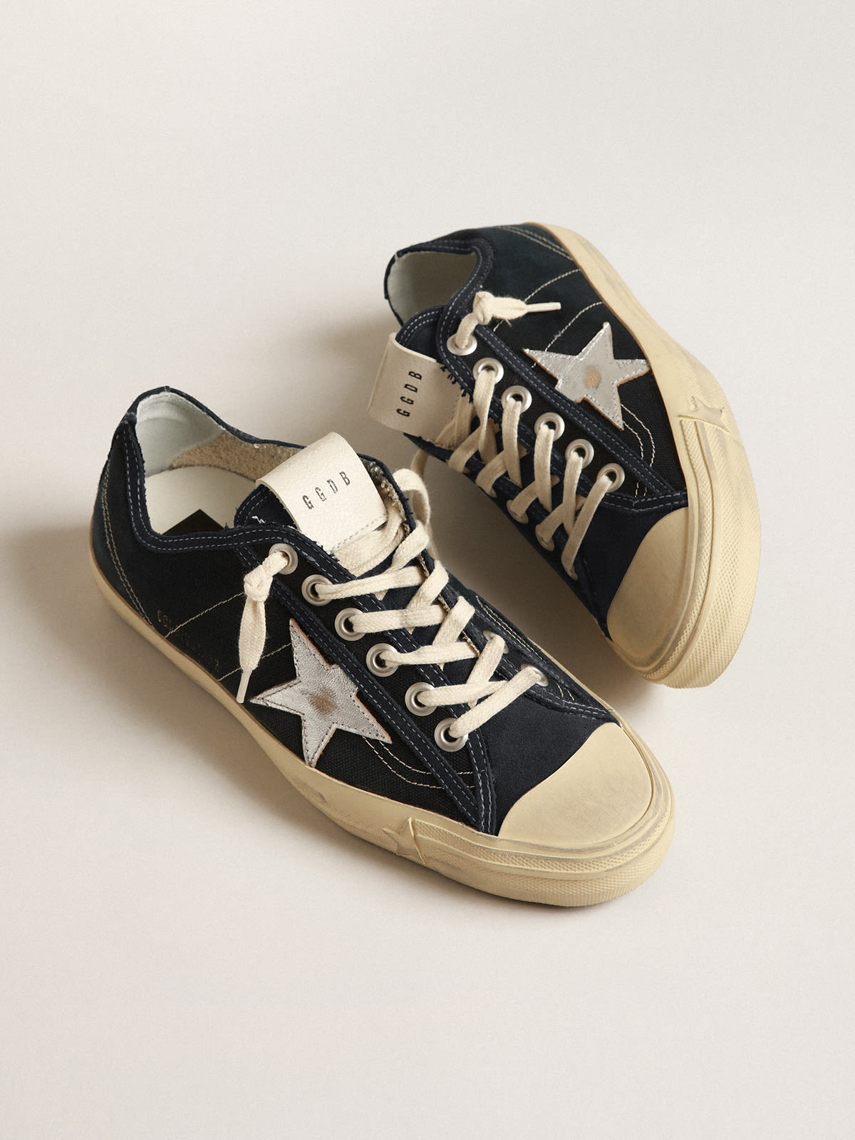 Golden Goose - V-Star in navy-blue canvas with a silver laminated leather star in 