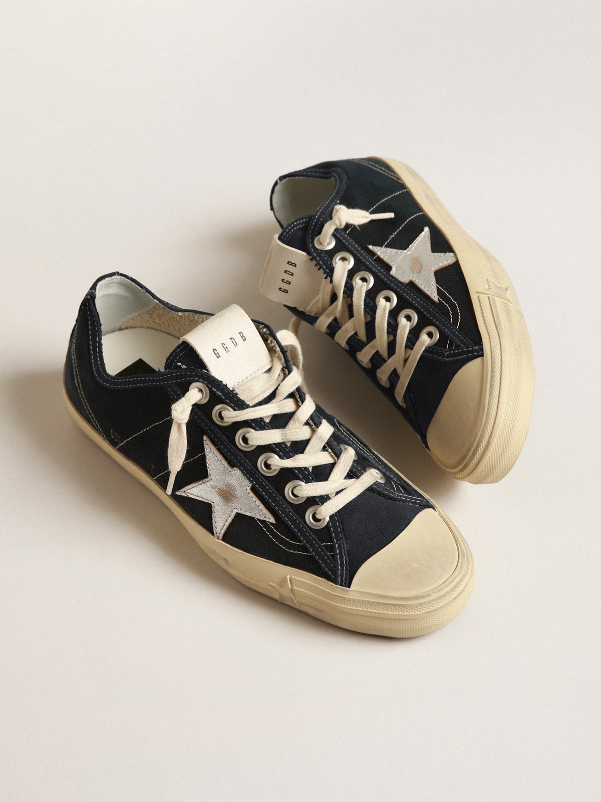 V-Star in navy-blue canvas with a silver laminated leather star