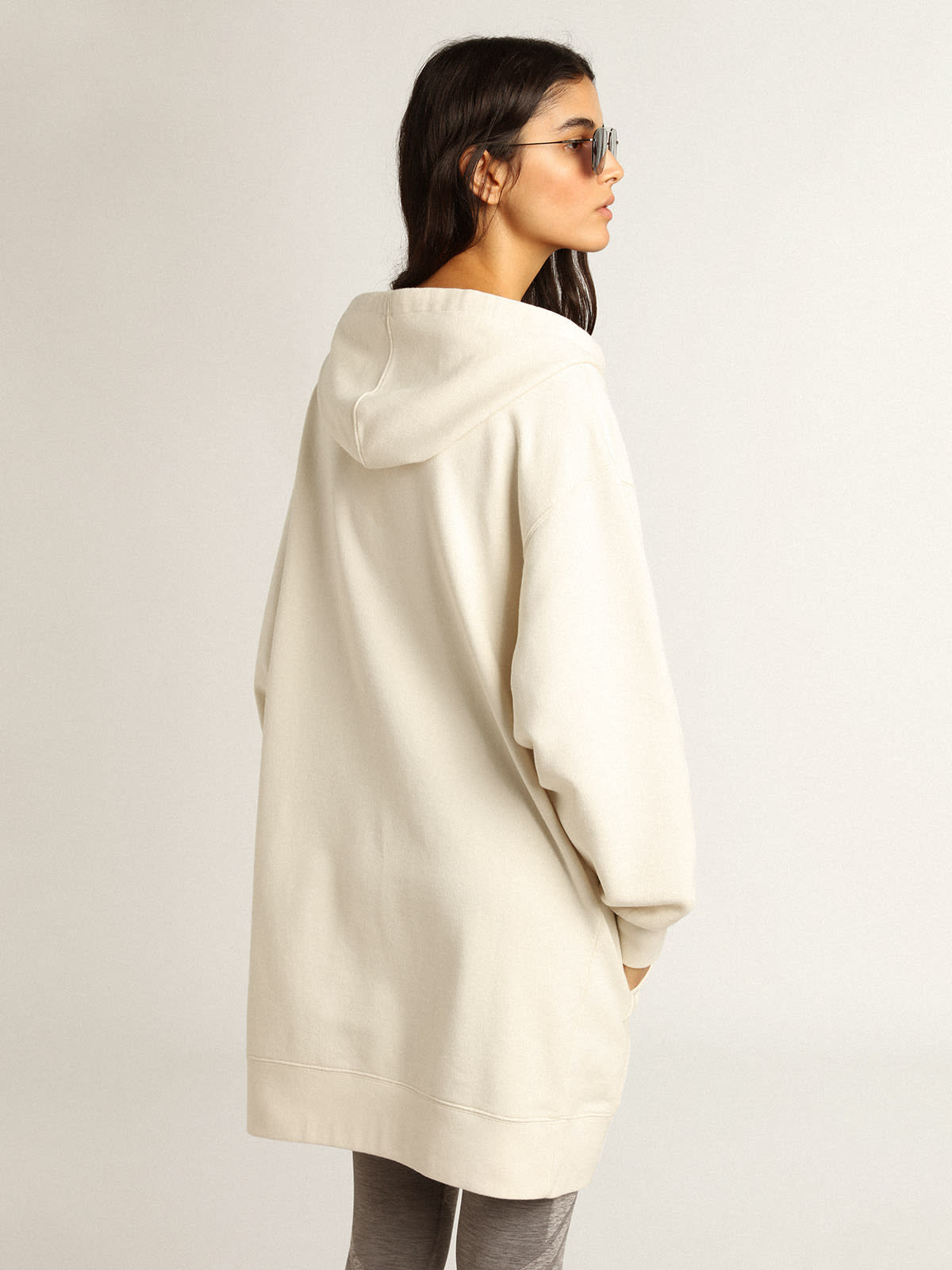 White sweatshirt dress with hood and Golden patch