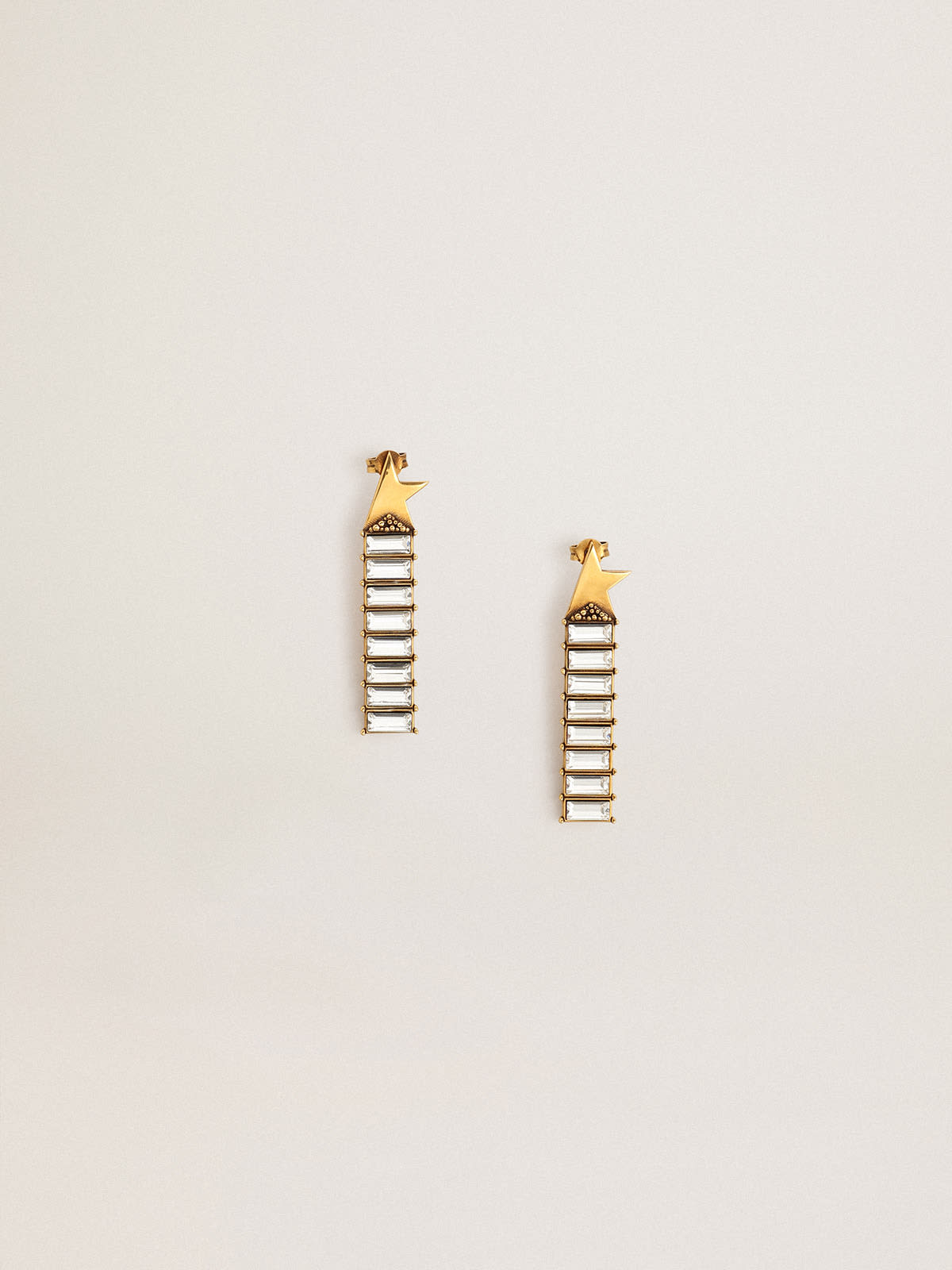 Golden Goose - Drop earrings with antique gold star and baguette-shaped crystals in 