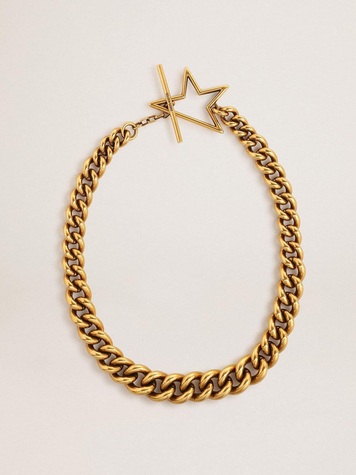 Golden Goose - Necklace in old gold decreasing chain with star-shaped clasp in 