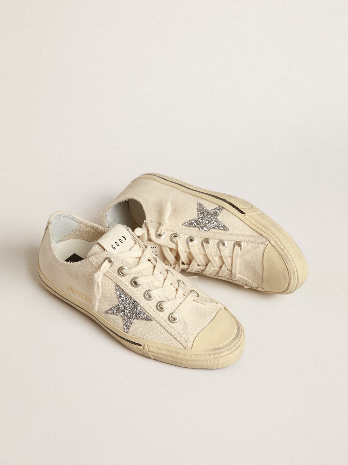 Golden Goose - V-Star in beige canvas with a silver glitter star in 