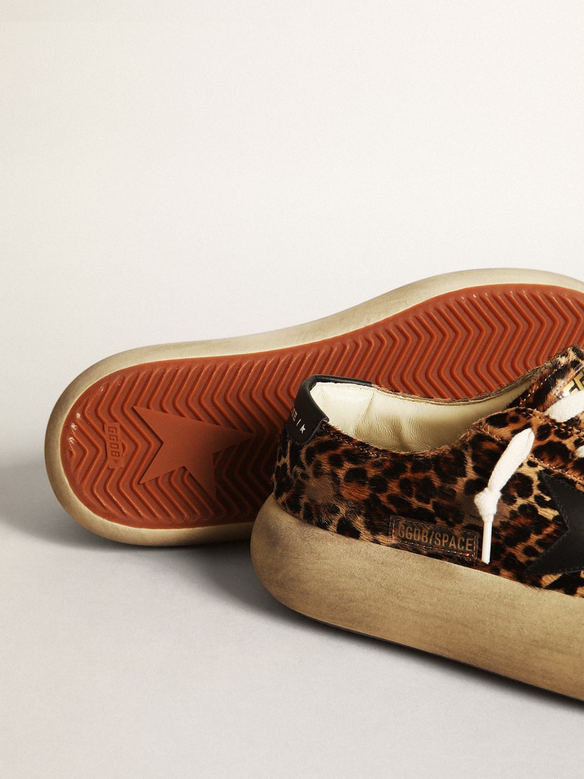 Golden Goose - Women's Space-Star shoes in leopard-print pony skin with black leather star and heel tab in 