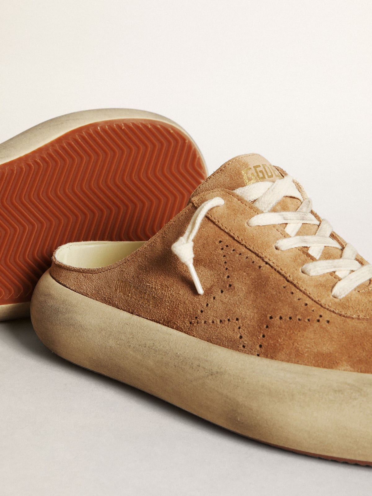 Women's Space-Star Sabot in tobacco-colored suede with perforated star