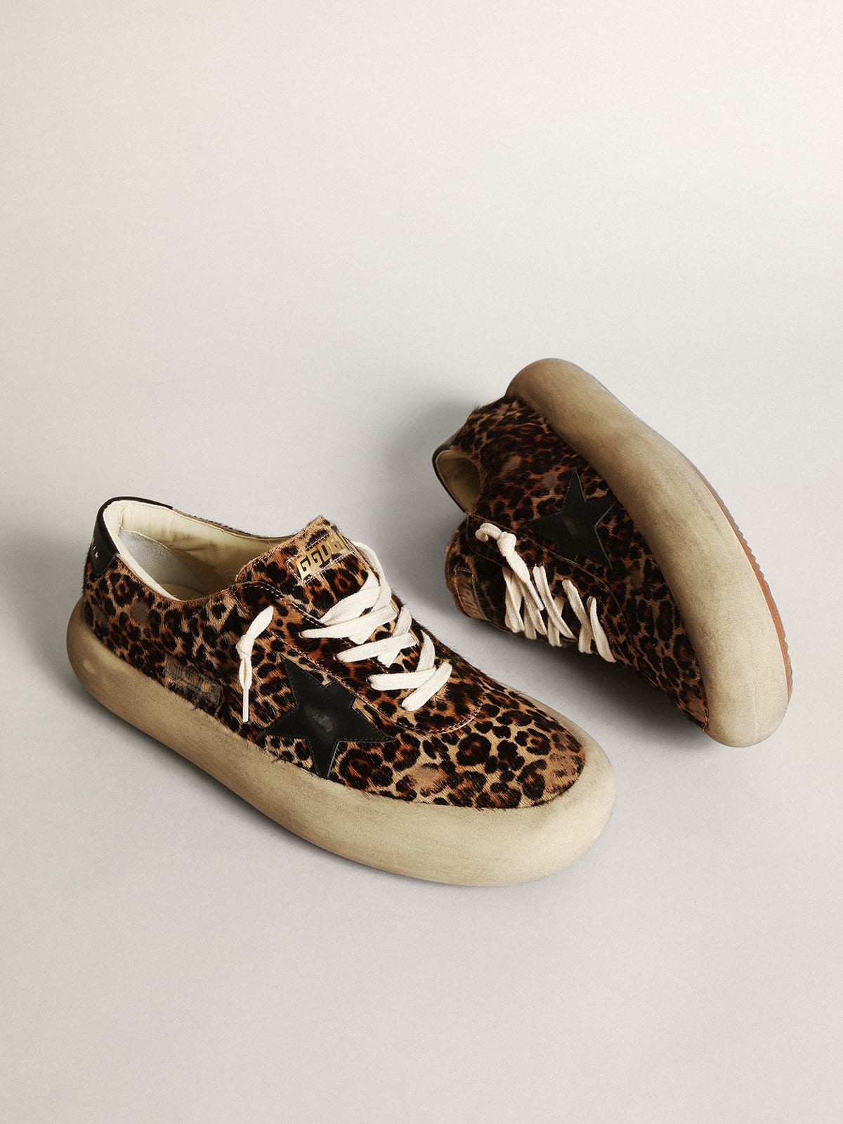 Men's Space-Star in leopard print pony skin with black star and heel