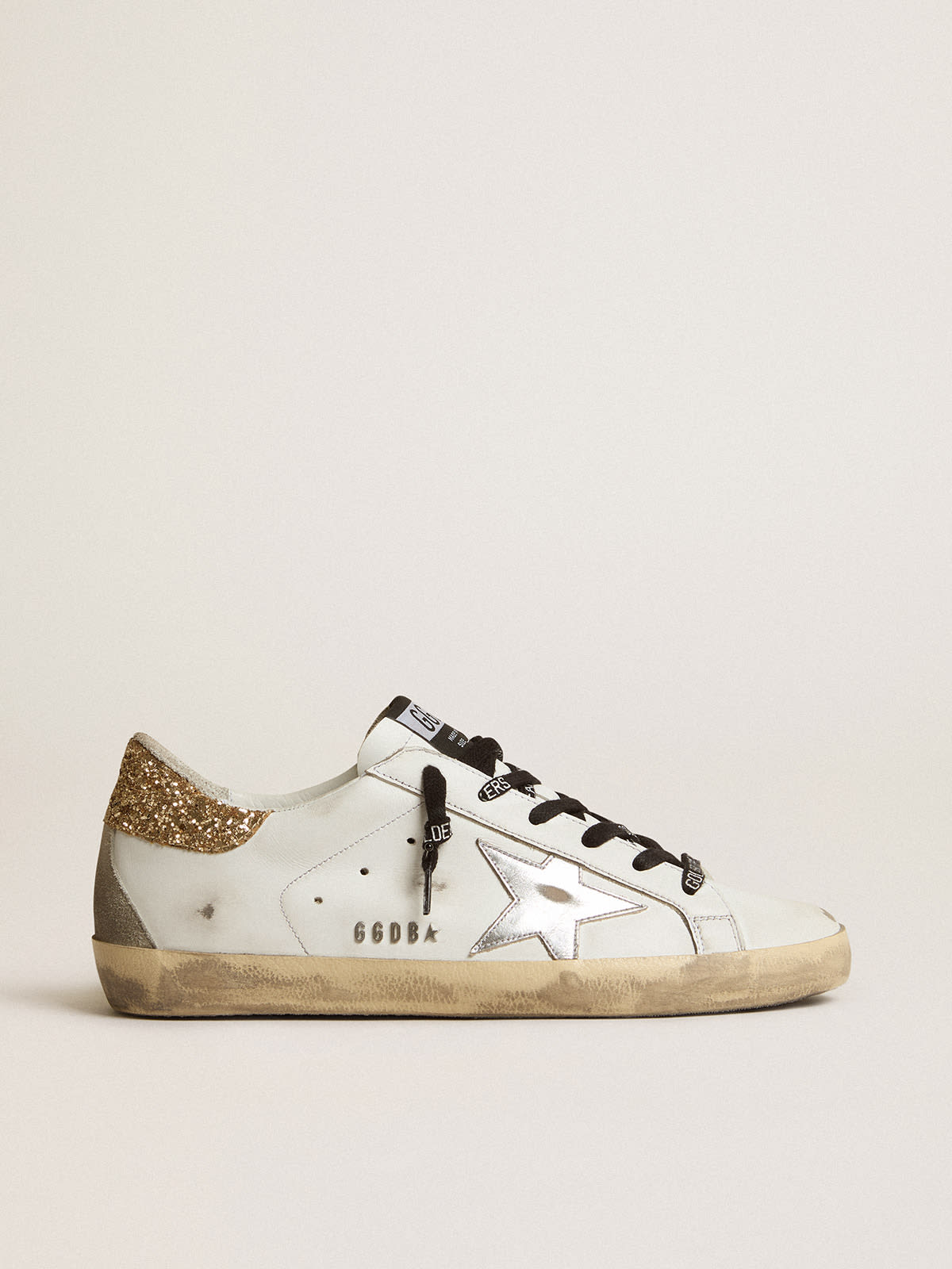 Golden Goose - White leather Super-Star sneakers with glittery heel tab in 