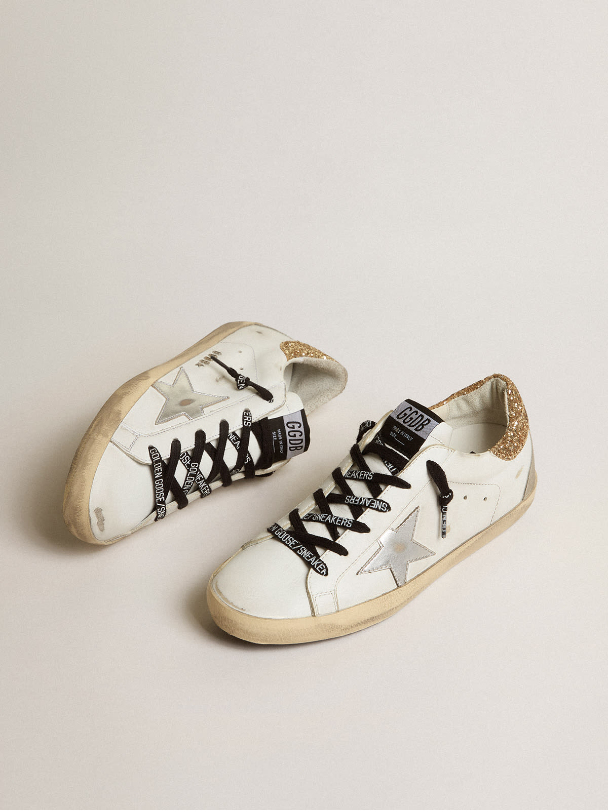 Golden Goose - Women's white leather Super-Star sneakers with glittery heel tab in 