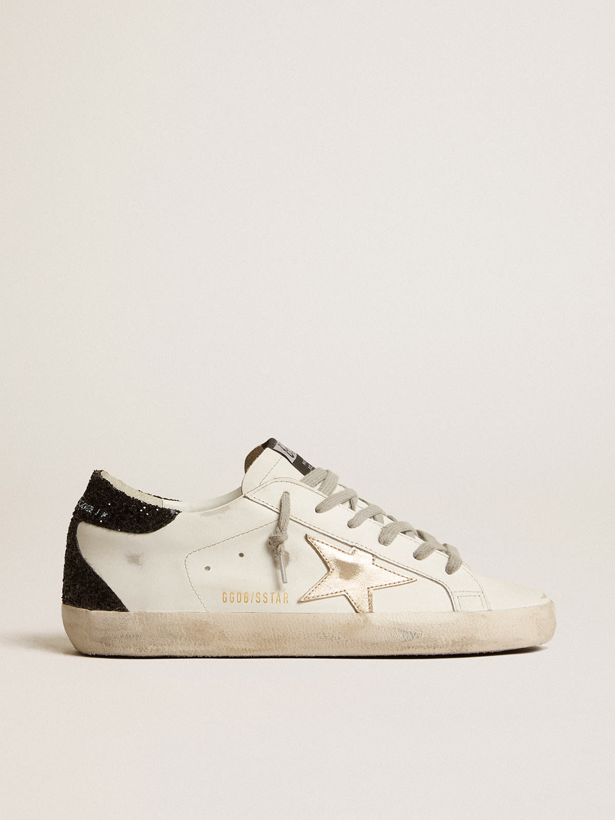 Golden Goose - Super-Star with gold star and black glitter heel tab in 