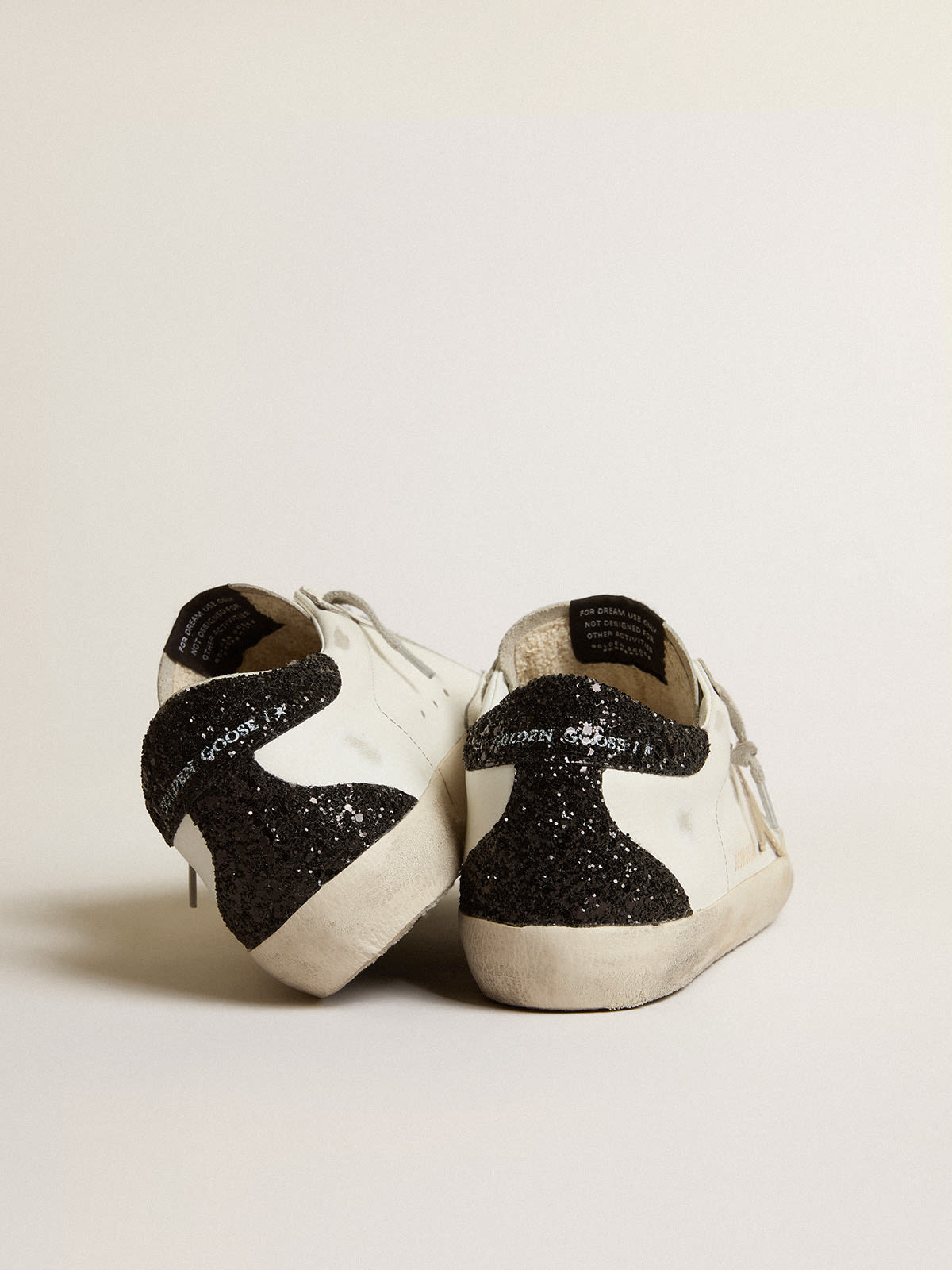 Golden Goose - Super-Star with gold star and black glitter heel tab in 