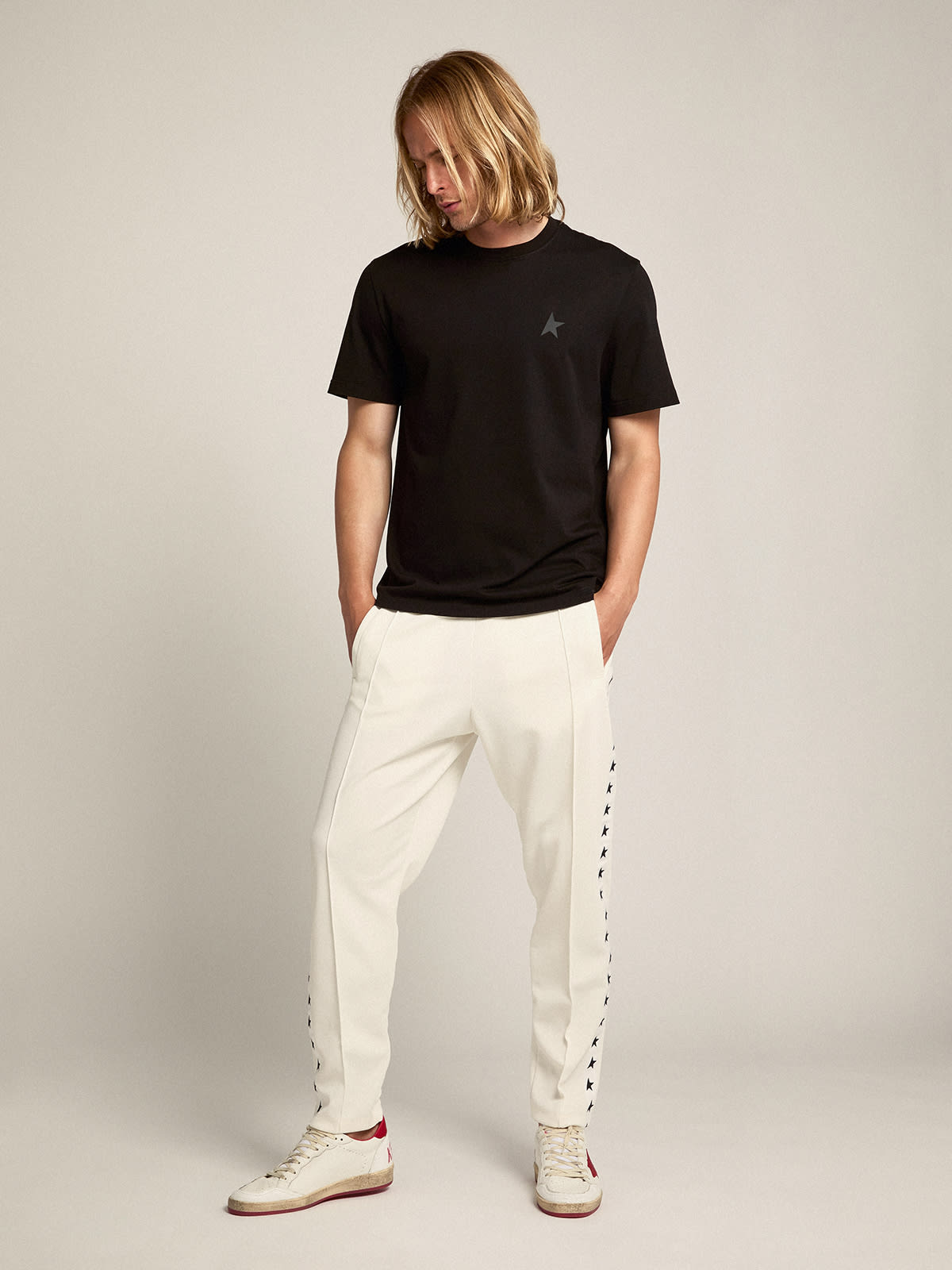 Pantalon de jogging homme blanc avec toiles noires sur les c t s