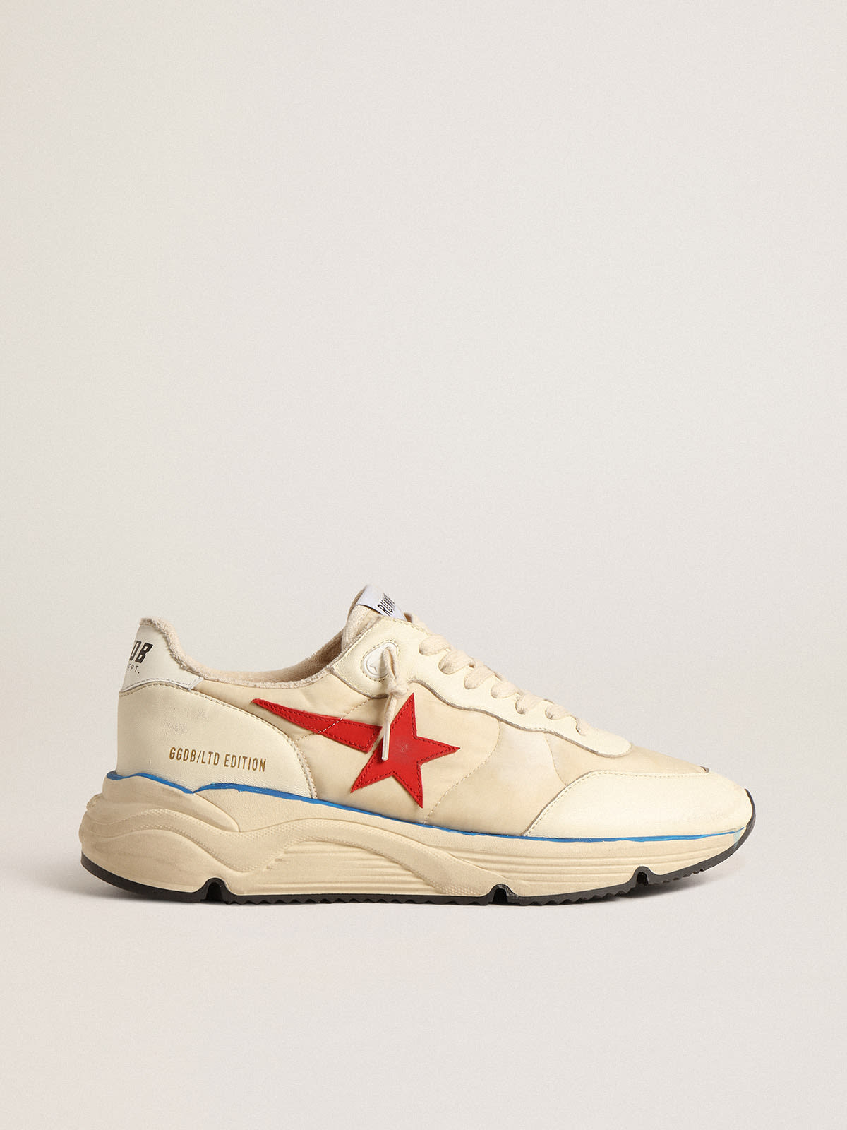 Men s Running Sole LTD in beige nylon with red leather star