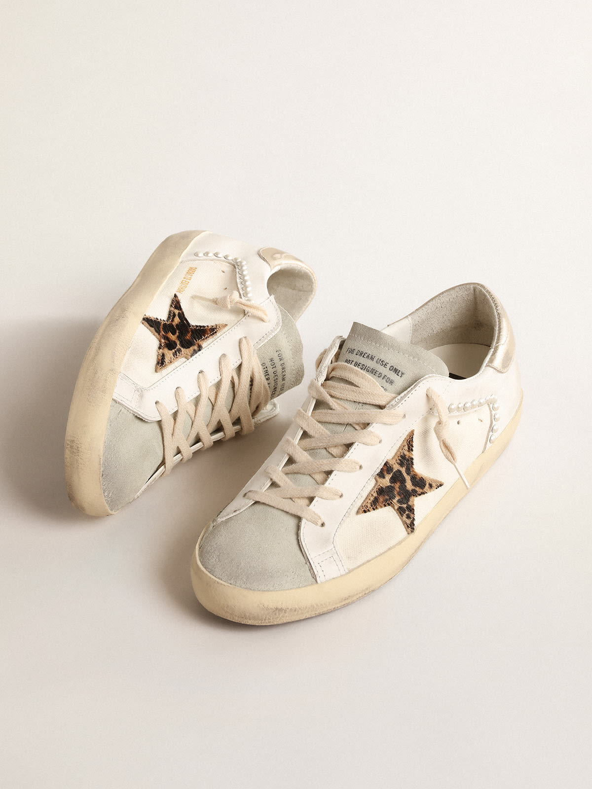 Super-Star LTD in canvas and leather with leopard-print pony skin star ...