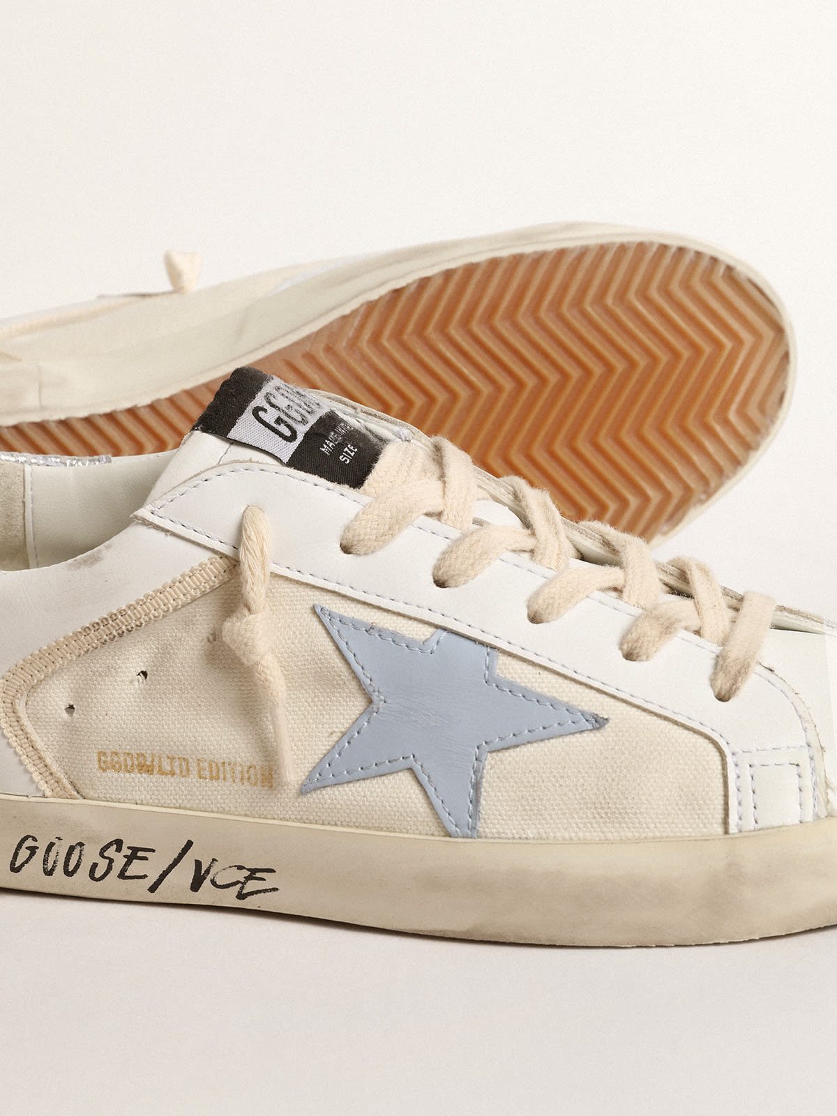Golden Goose - Super-Star LTD with light blue star and silver leather heel tab in 