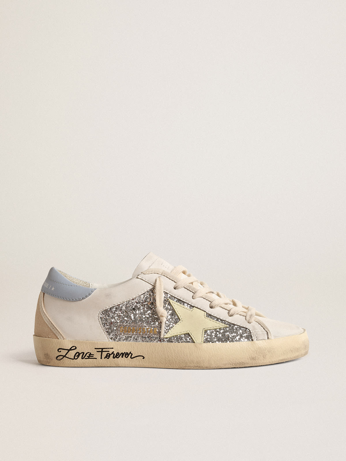 Golden Goose - Bio-based Super-Star with silver glitter and yellow leather star in 