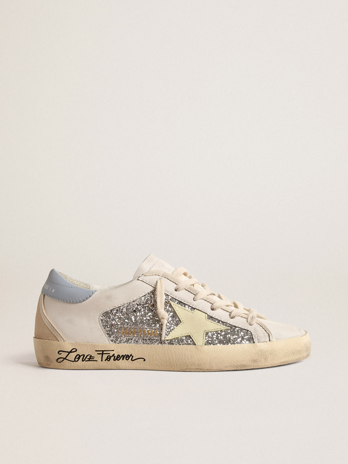 Super-Star bio-based con purpurina plateada y estrella piel amarilla | Golden Goose