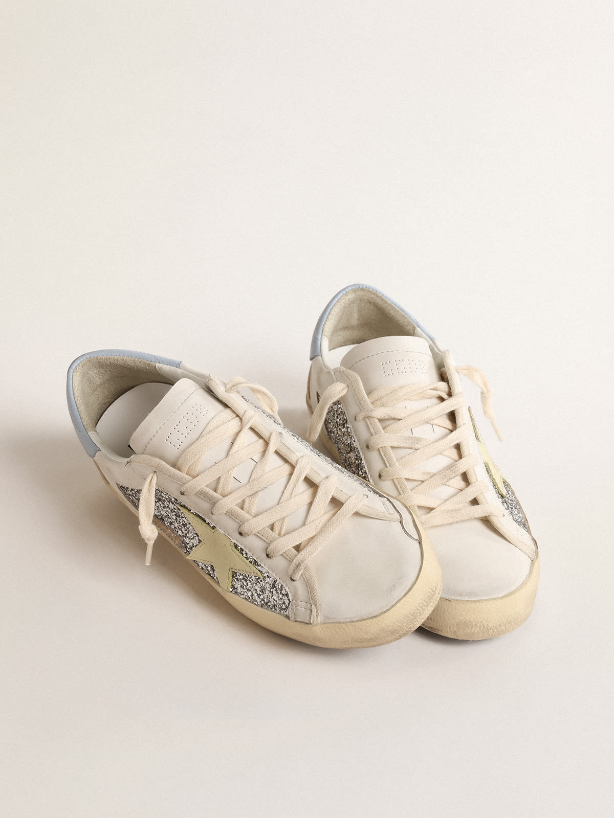 Golden Goose - Bio-based Super-Star with silver glitter and yellow leather star in 