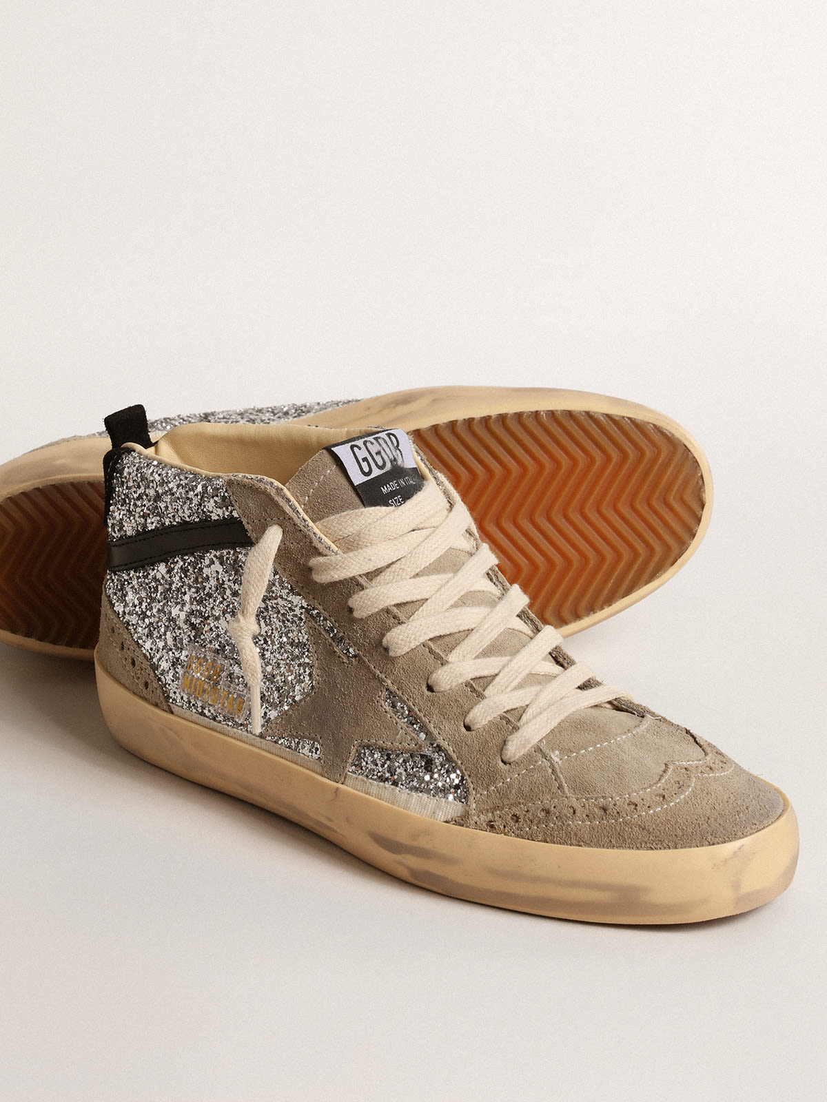 Mid Star in silver glitter with suede star and black flash