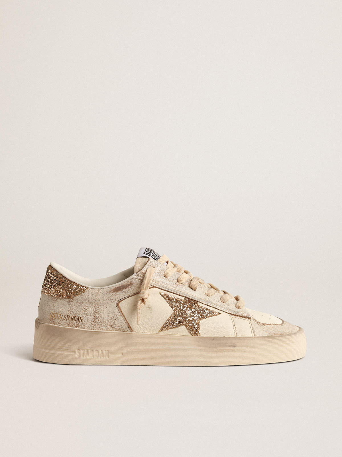 Stardan in ecru nappa leather with gold glitter star and heel tab ...