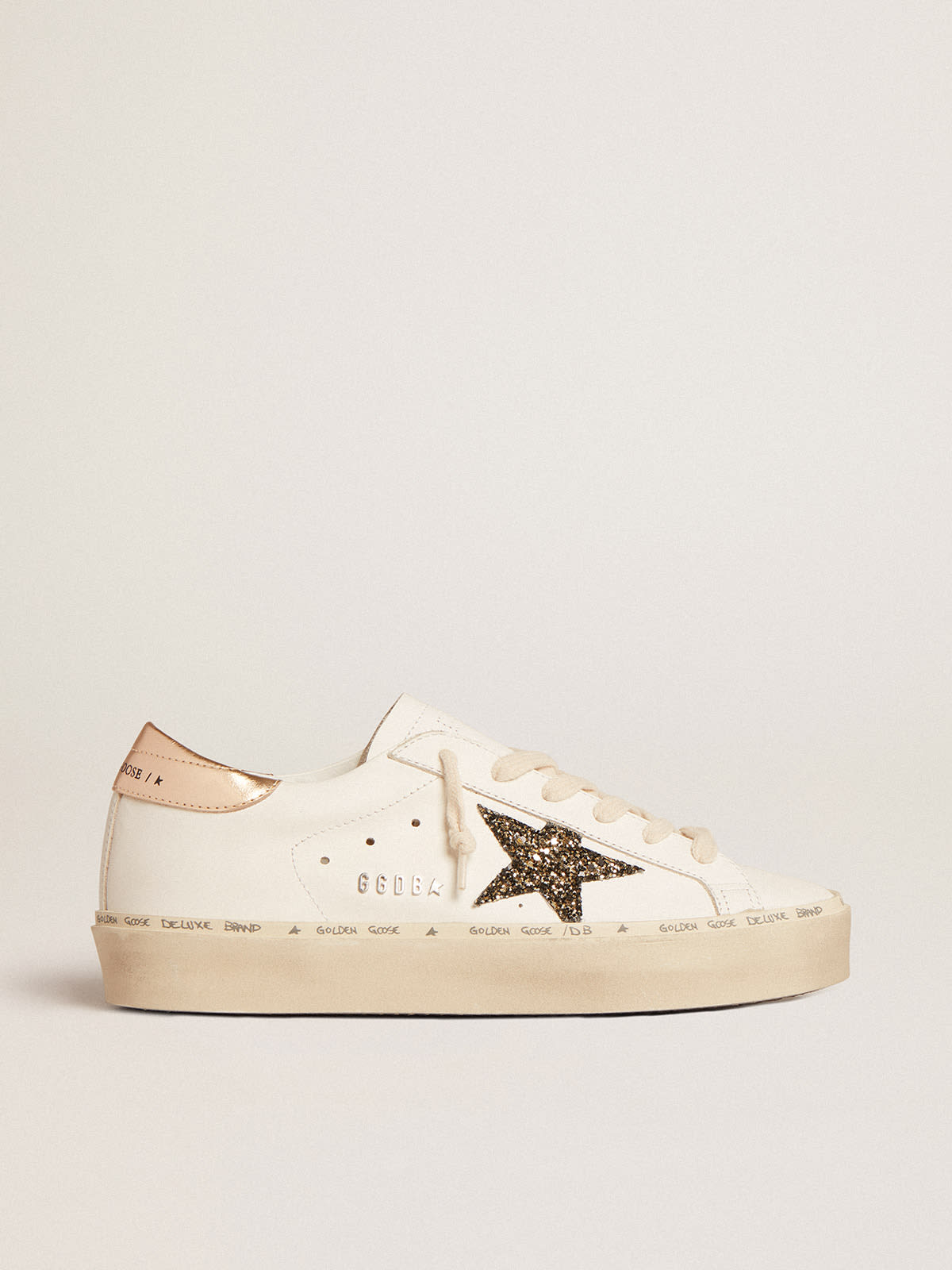 Golden Goose - Hi Star LTD with black and gold glitter star and gold heel tab in 