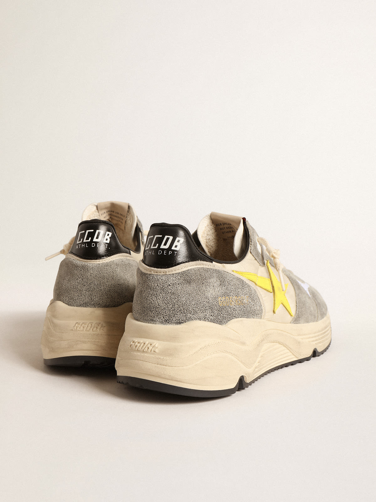 Running Sole in beige nylon and gray suede with yellow star