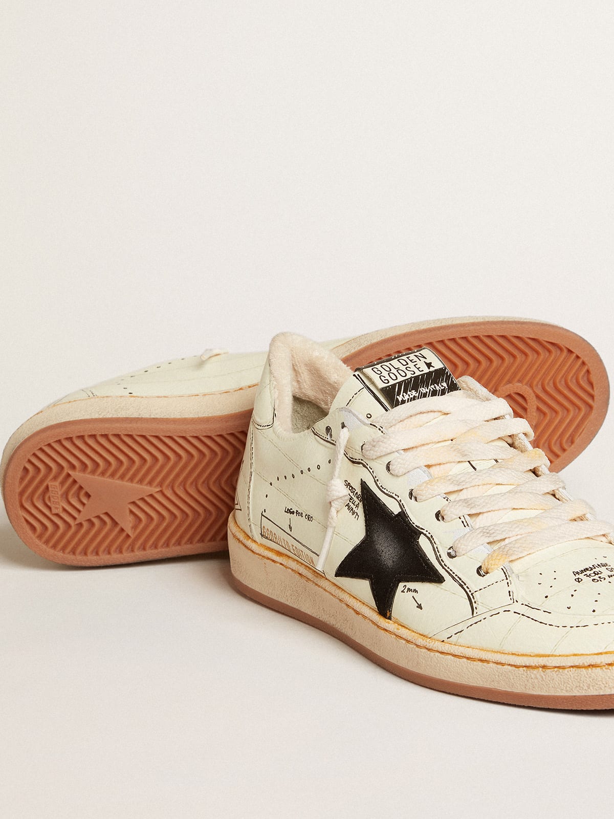 Ball Star LTD with black suede star and black lettering | Golden Goose