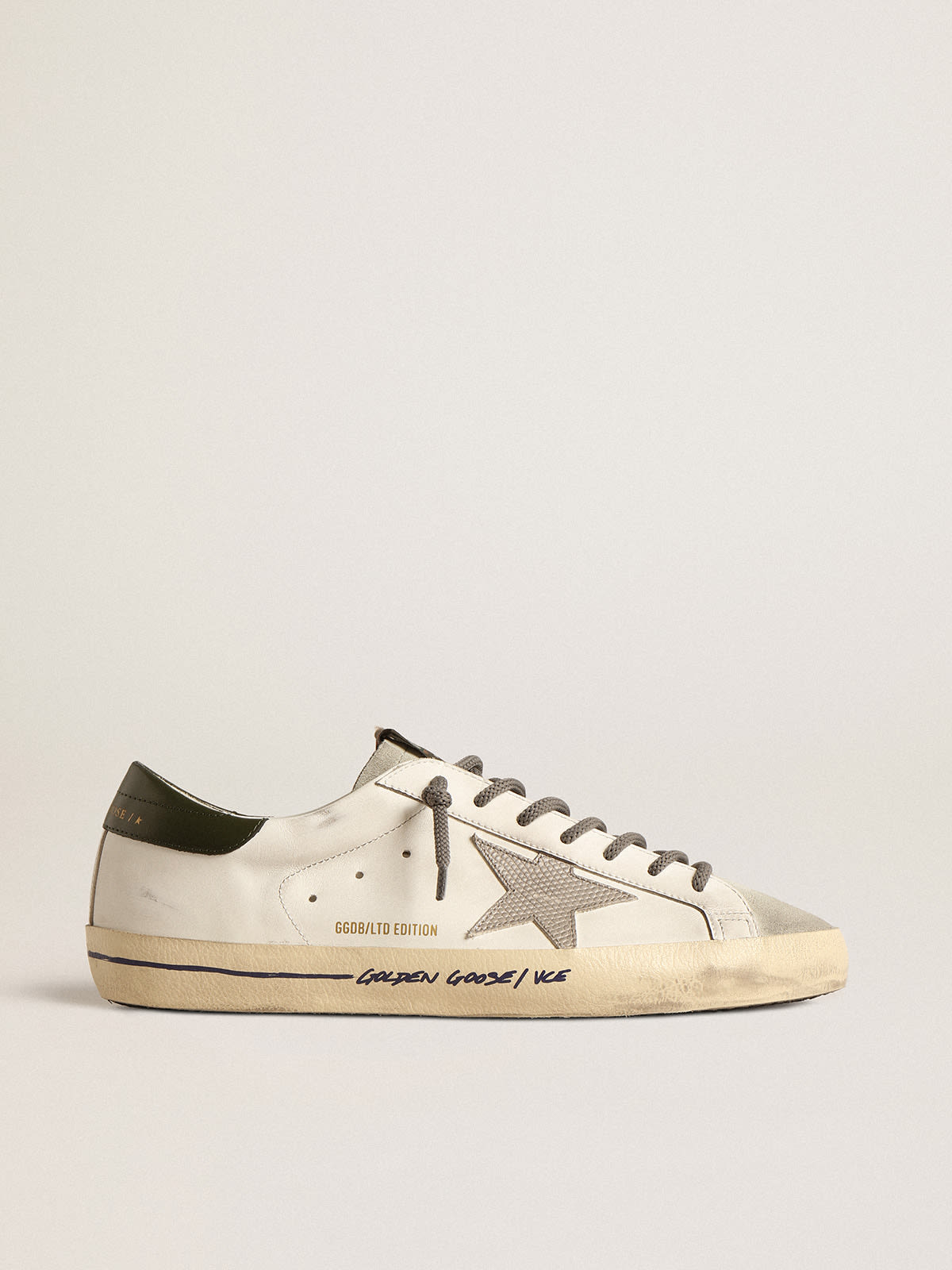 Super Star LTD with croc print star and green heel tab Golden Goose