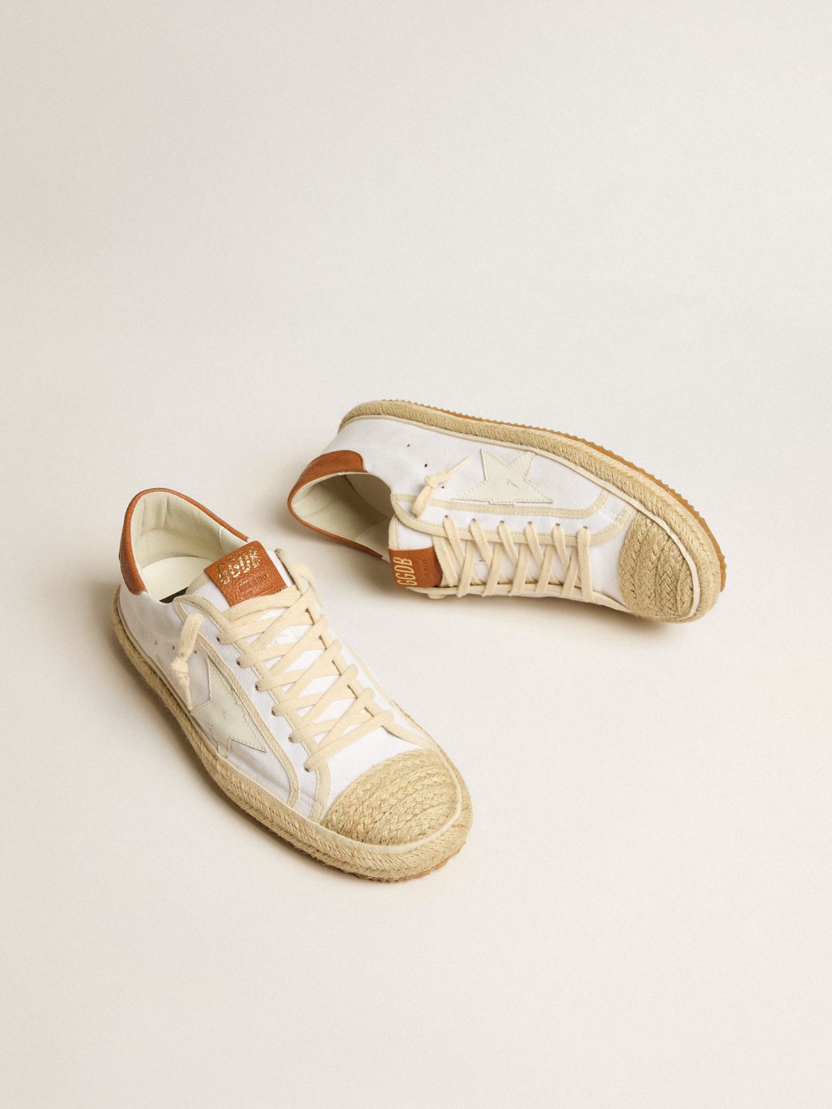 Golden Goose - Men’s Super-Star LTD in canvas with white leather star and raffia toe in 