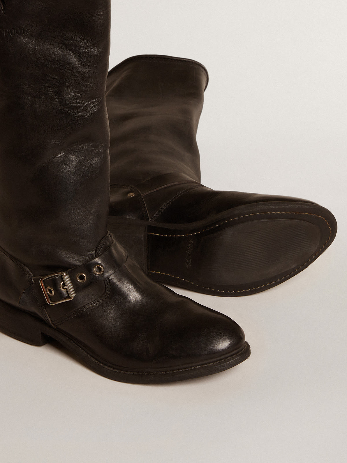 High Biker boots in black leather with silver studs and buckles