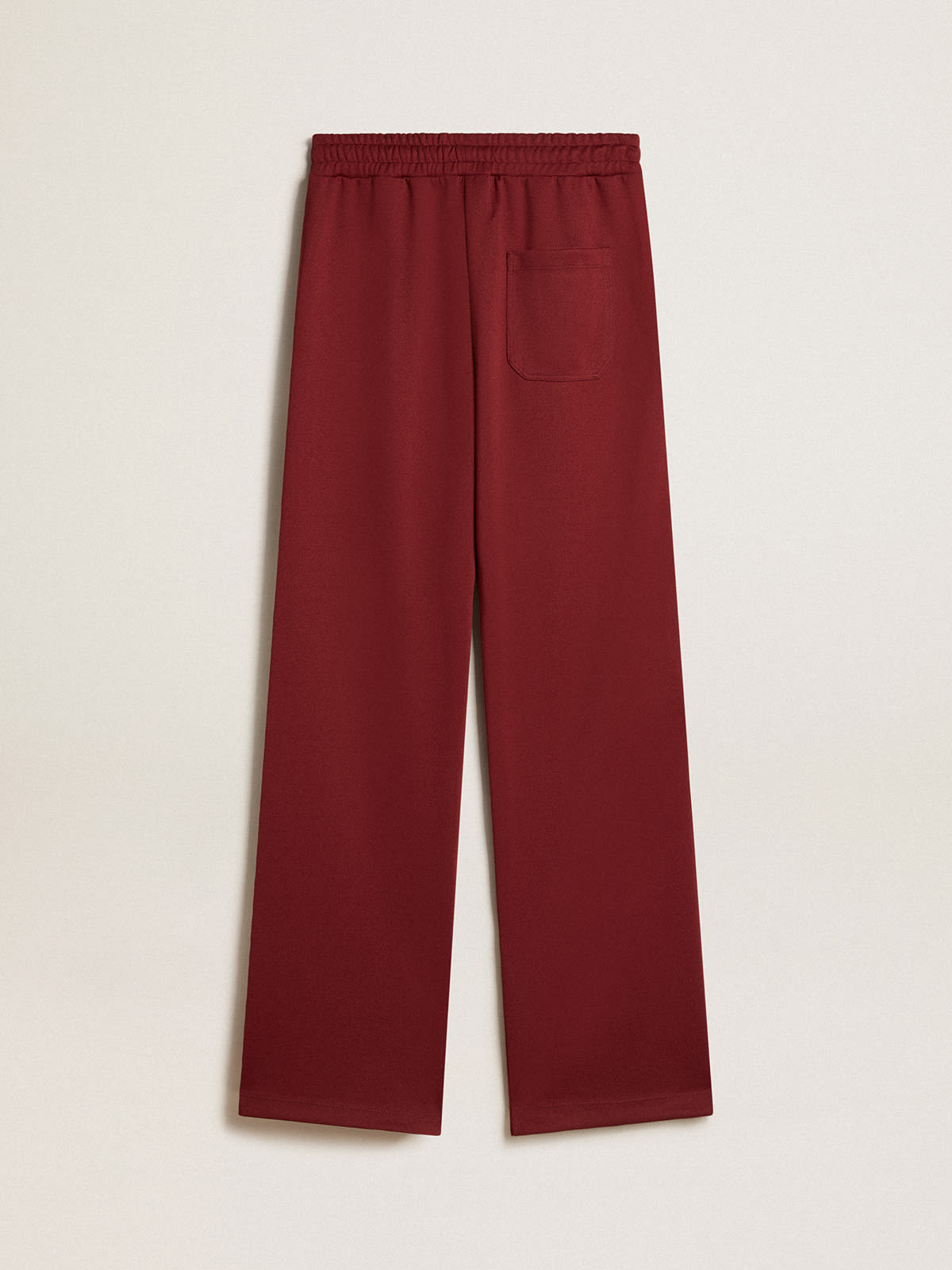 Women’s burgundy joggers with stars on the sides