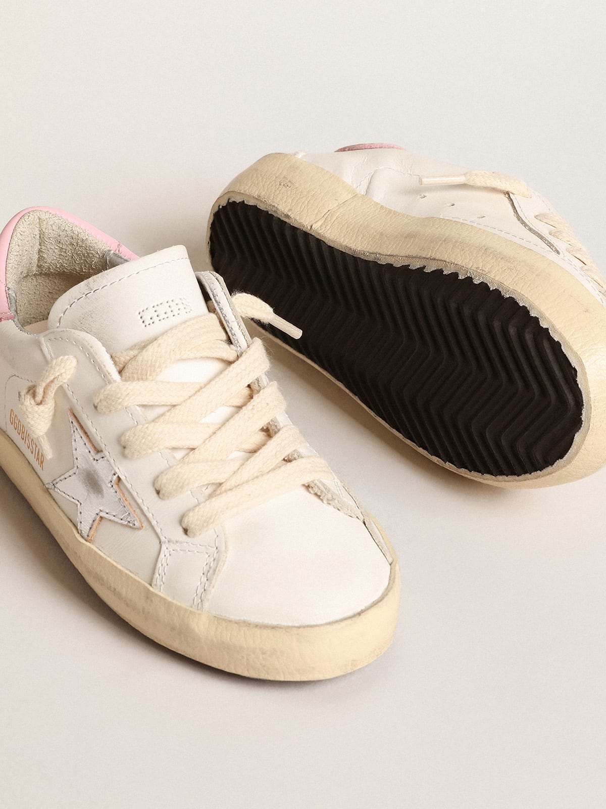 Old School Junior in pink suede with cream leather star and heel tab