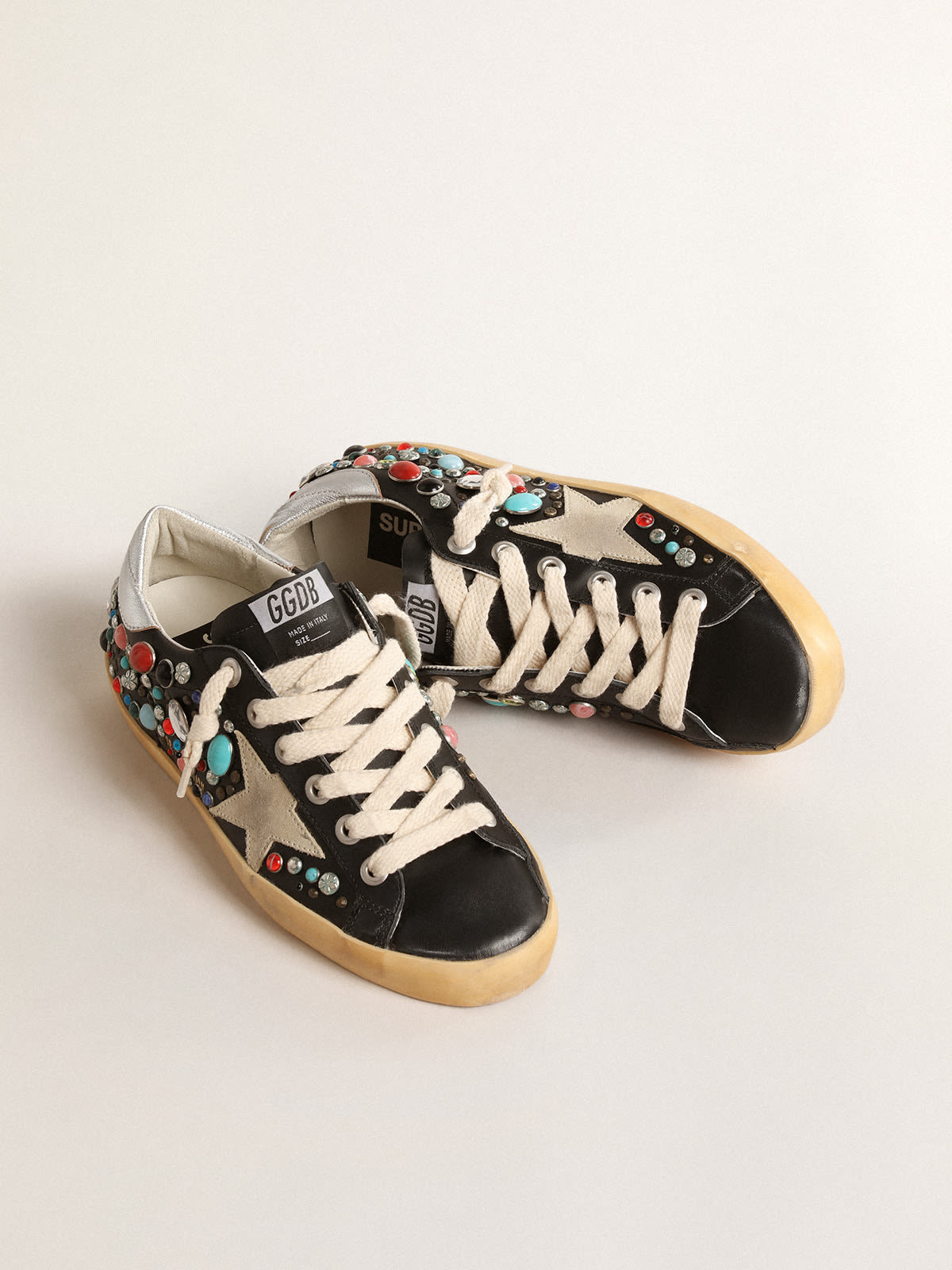 Super-Star with multicolored studs and beige suede star