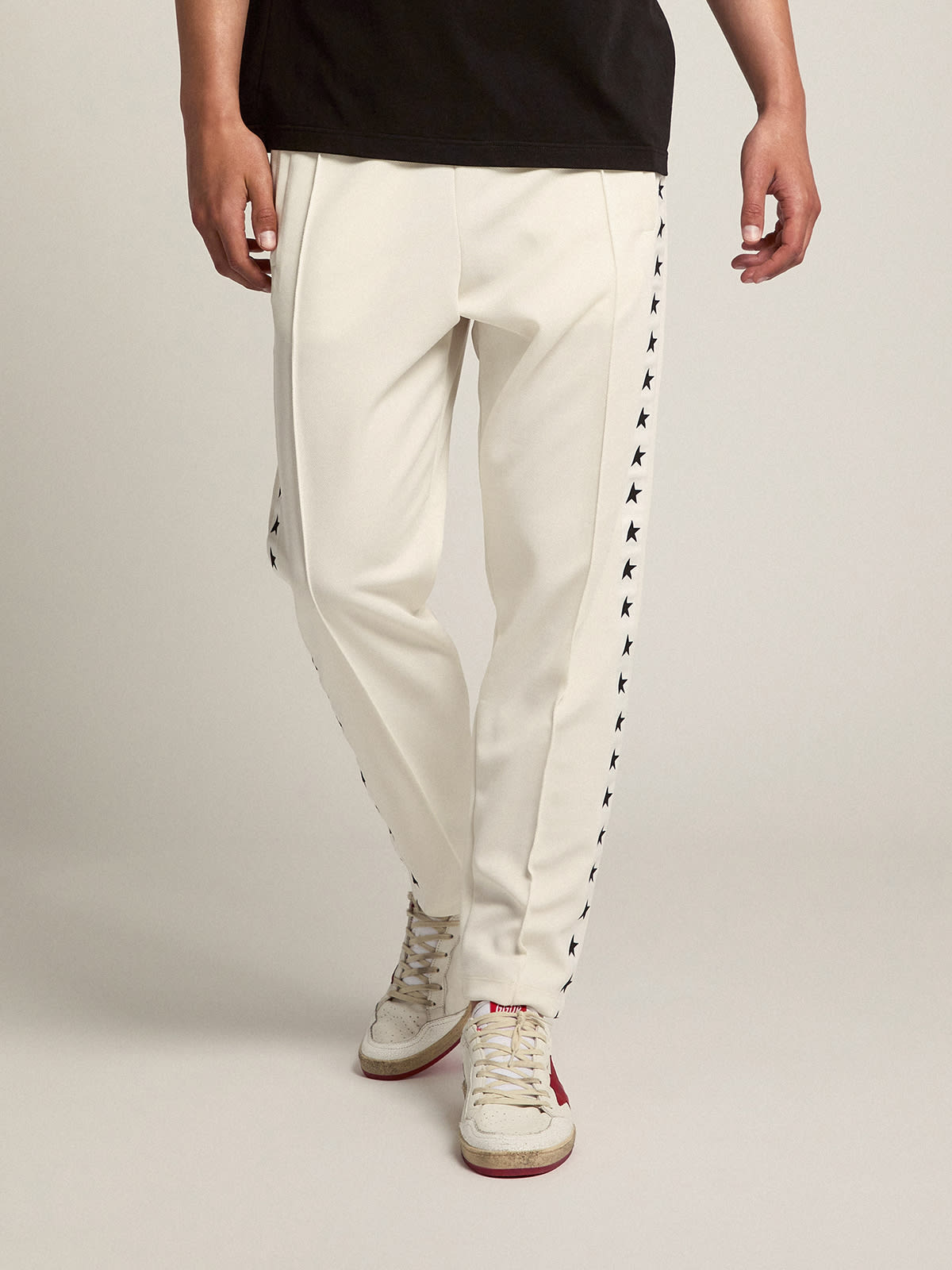 Golden Goose - Men’s white joggers with black stars on the sides in 