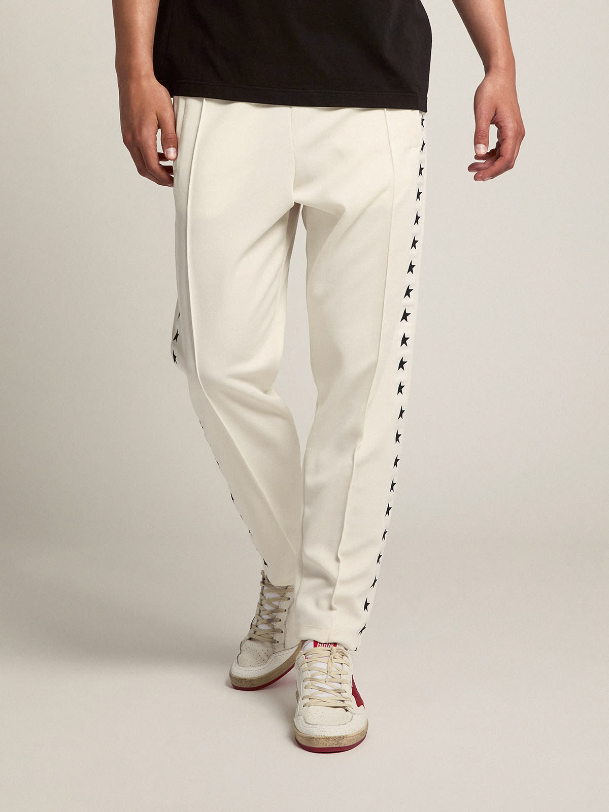 Golden Goose - Men's white joggers with black stars on the sides in 