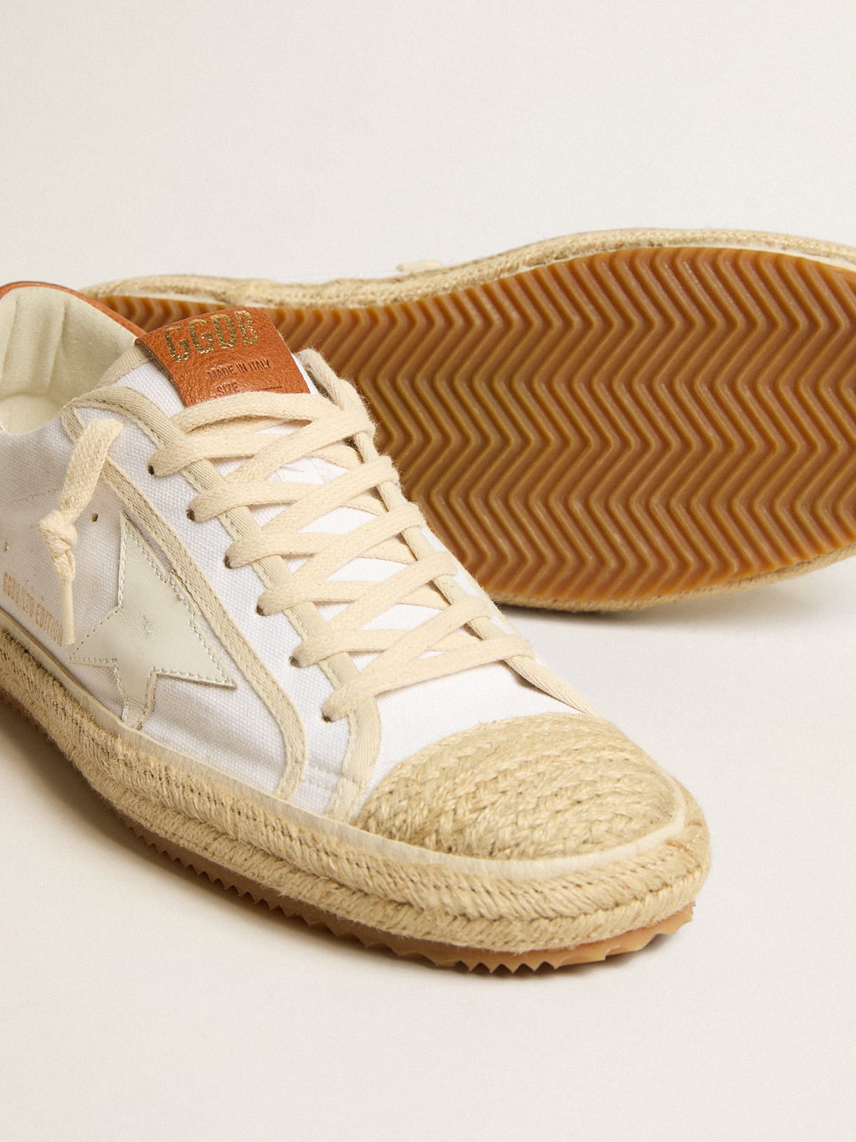 Golden Goose - Women’s Super-Star LTD in canvas with white leather star and raffia toe in 