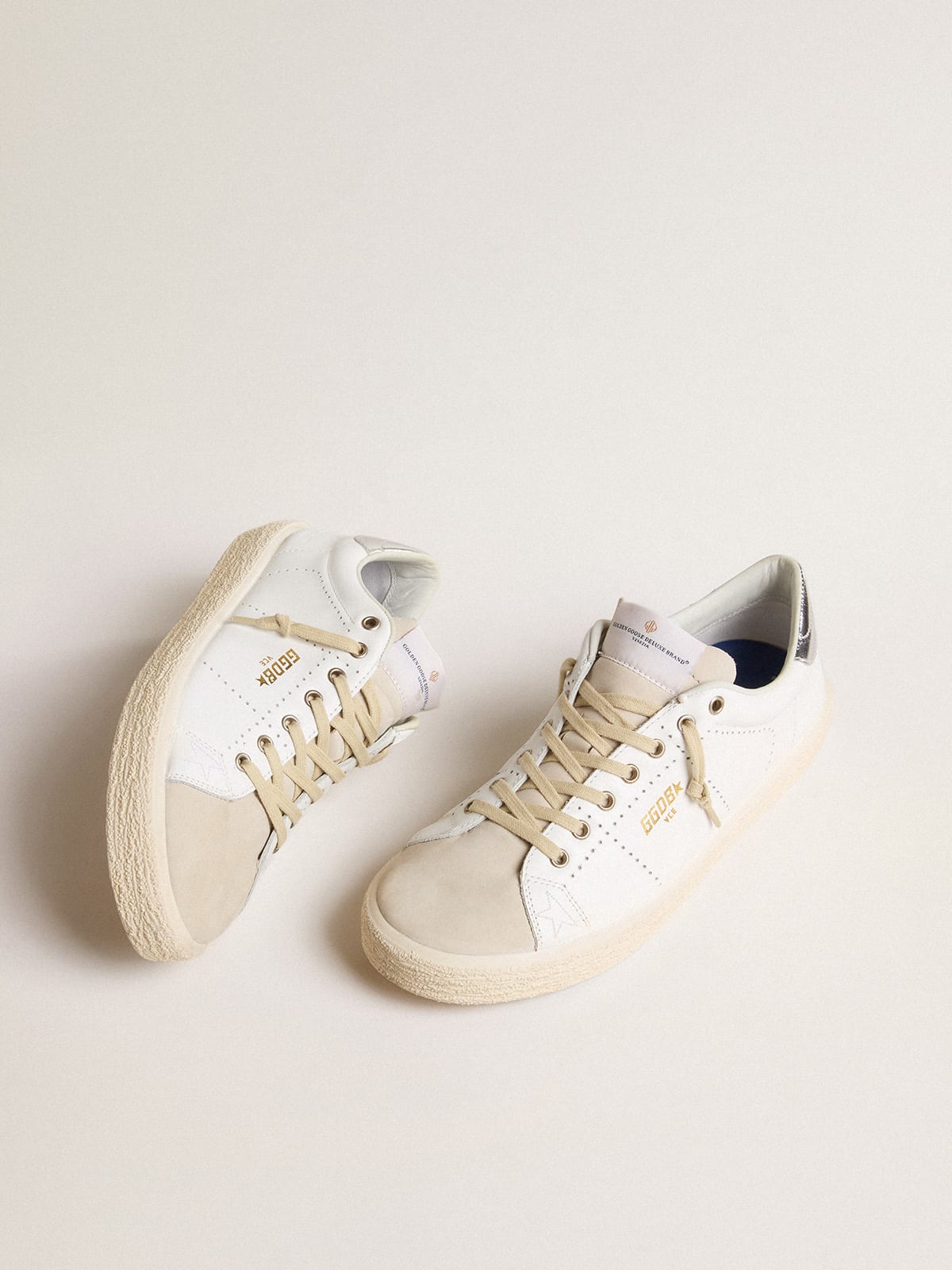 Golden goose store tennis sneakers