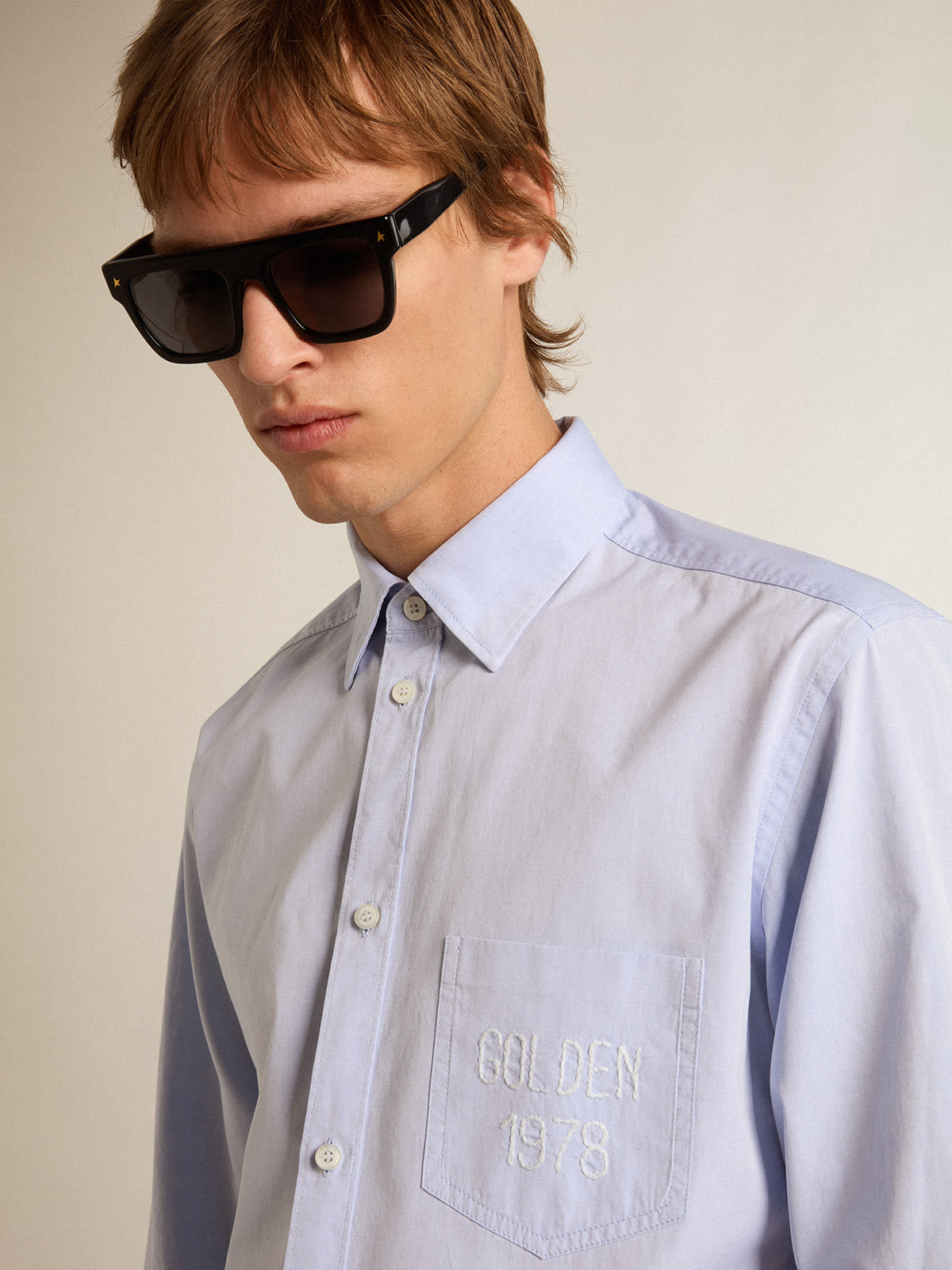 Baby-blue cotton shirt with embroidered pocket