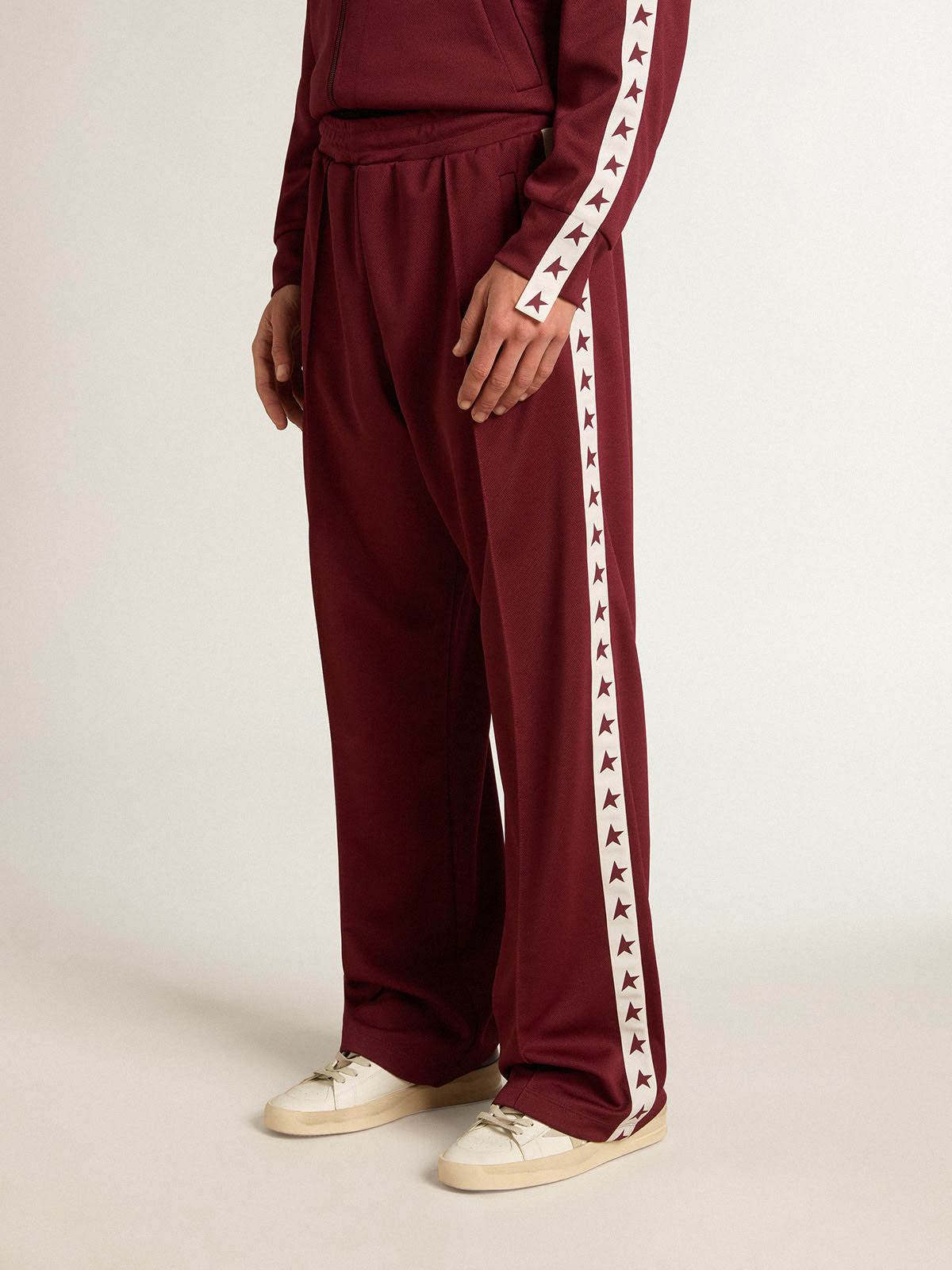 Golden Goose - Men’s burgundy joggers with stars on the sides in 