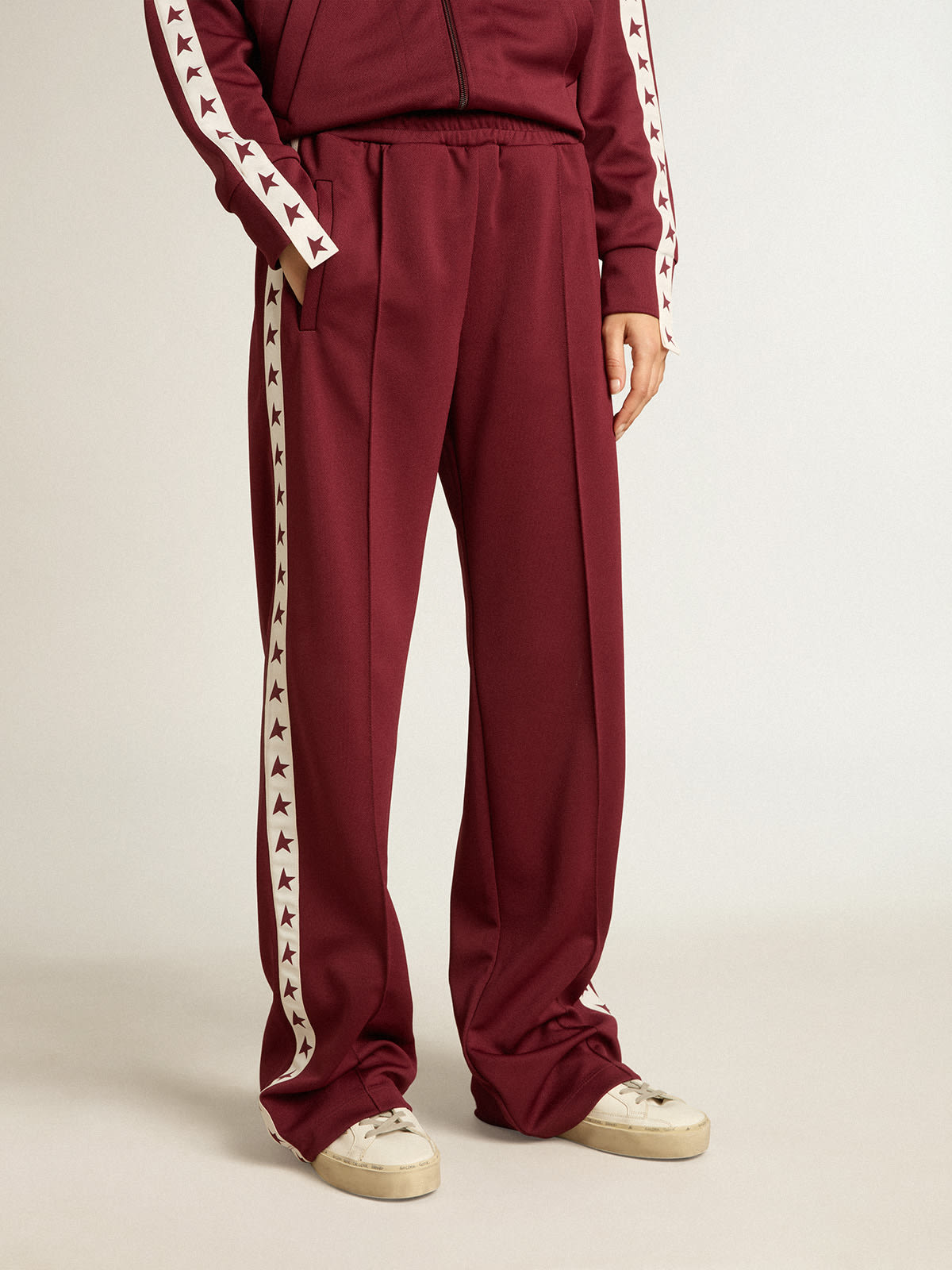 Golden Goose - Women’s burgundy joggers with stars on the sides in 