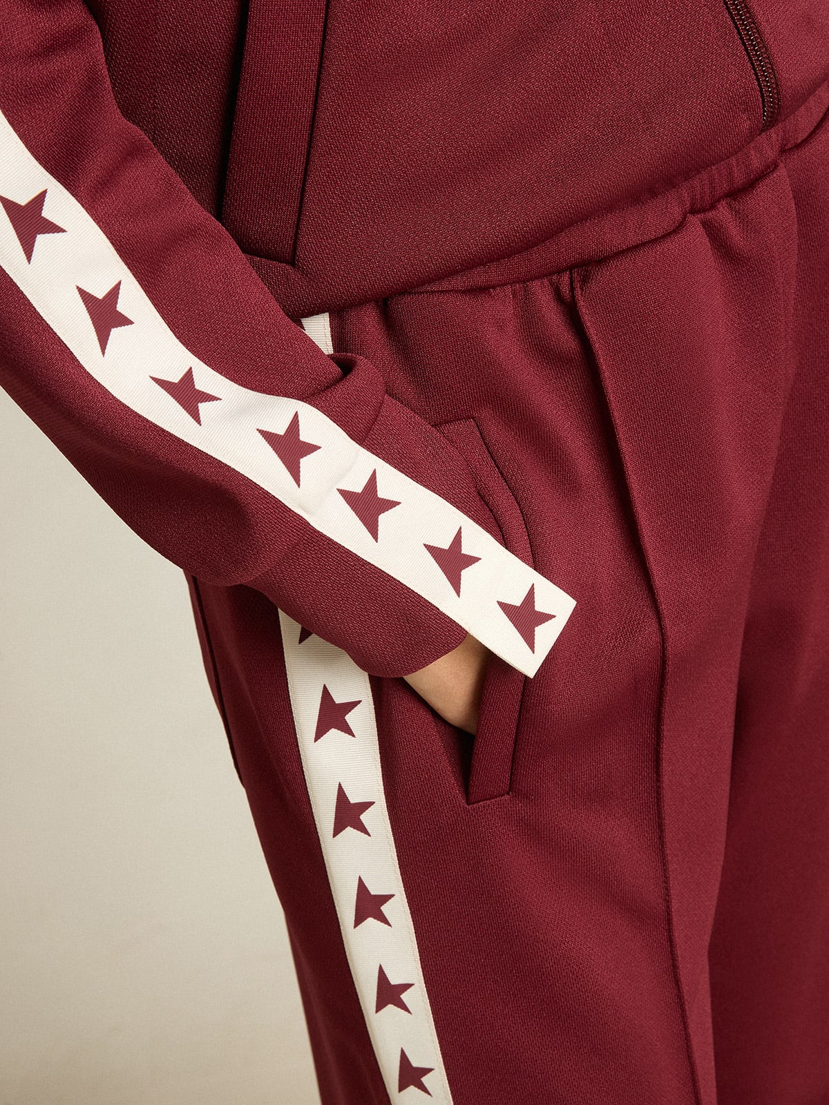 Golden Goose - Women’s burgundy joggers with stars on the sides in 