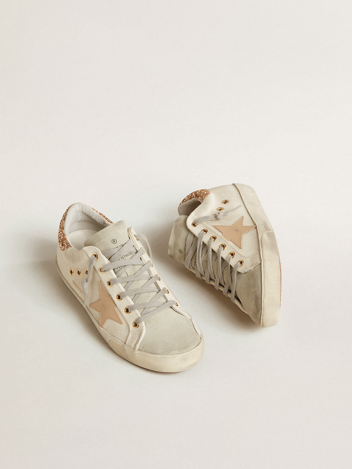 Super-Star LTD in canvas with sand star and glitter heel tab | Golden Goose