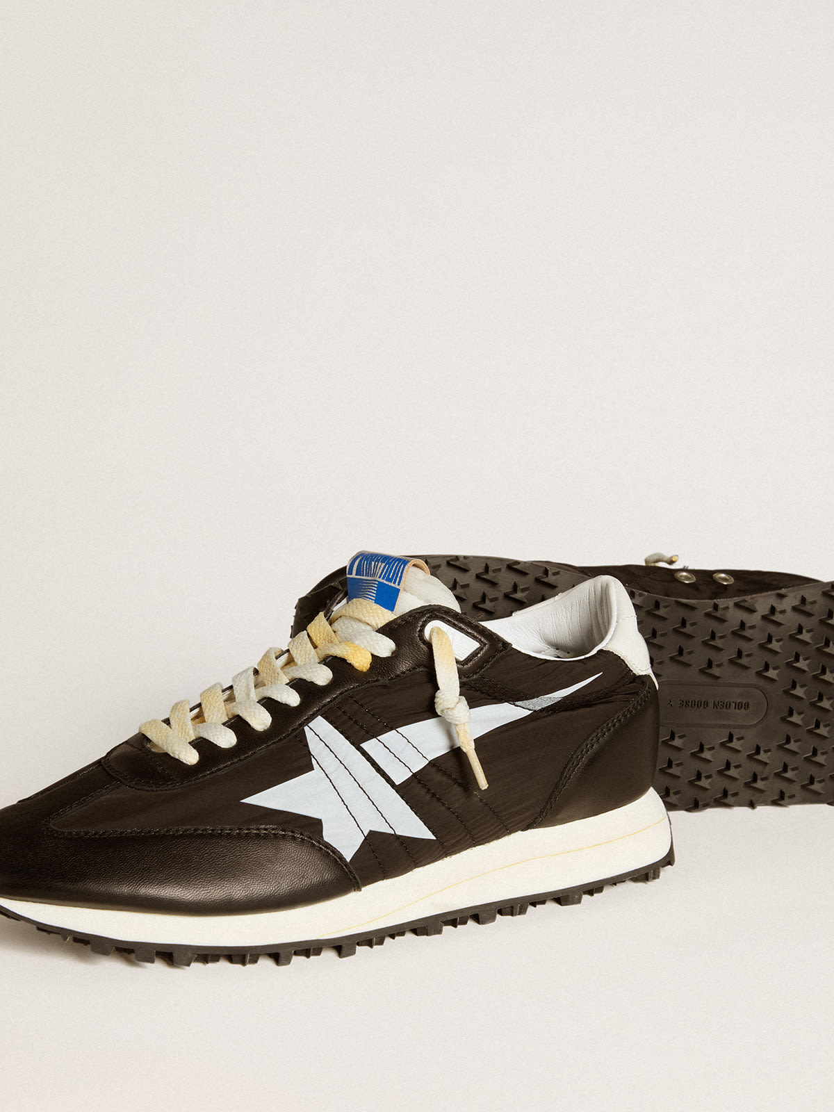 Golden goose best sale blanche et noir