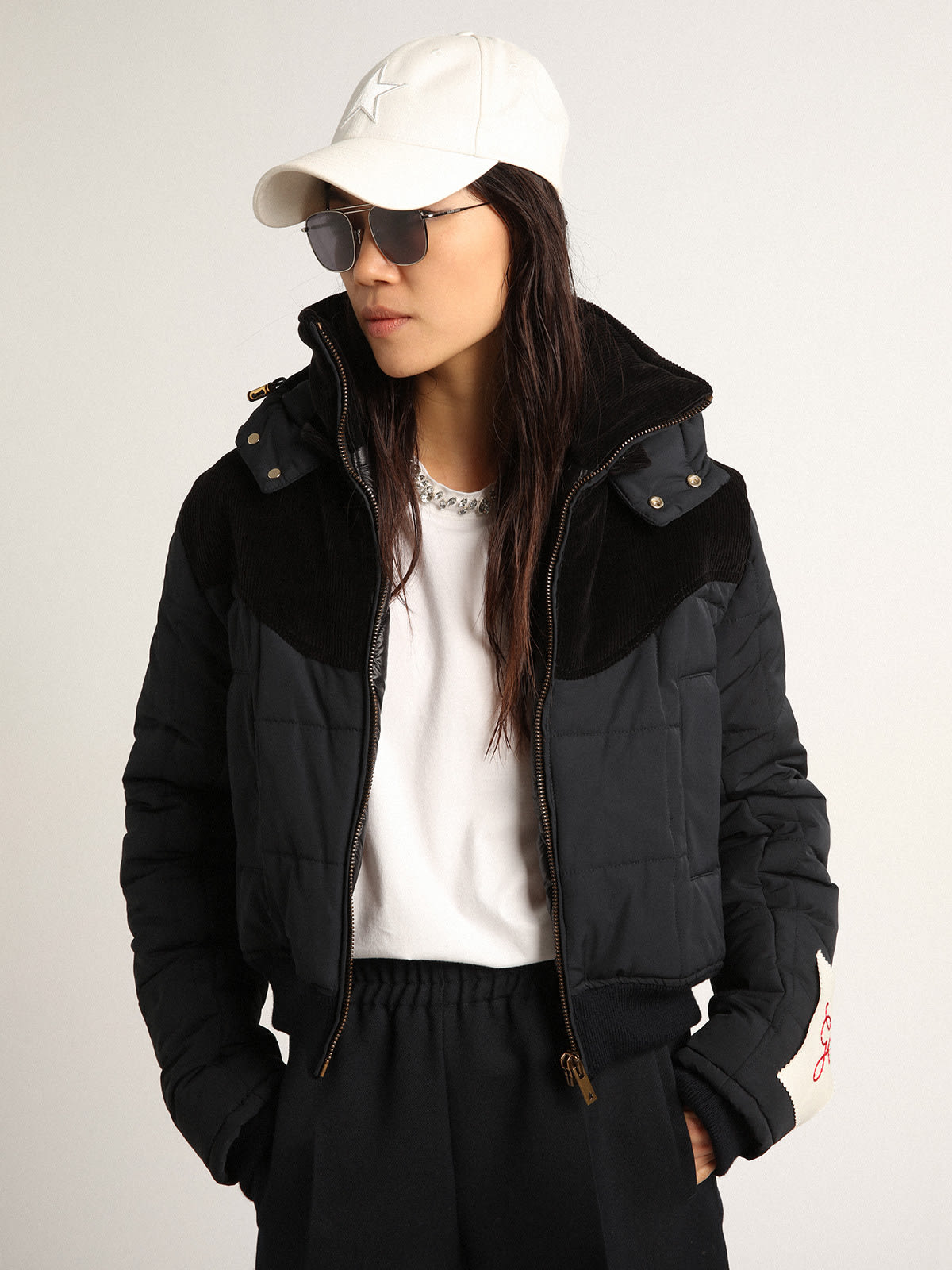 Women’s padded jacket in dark blue nylon and black cotton corduroy ...