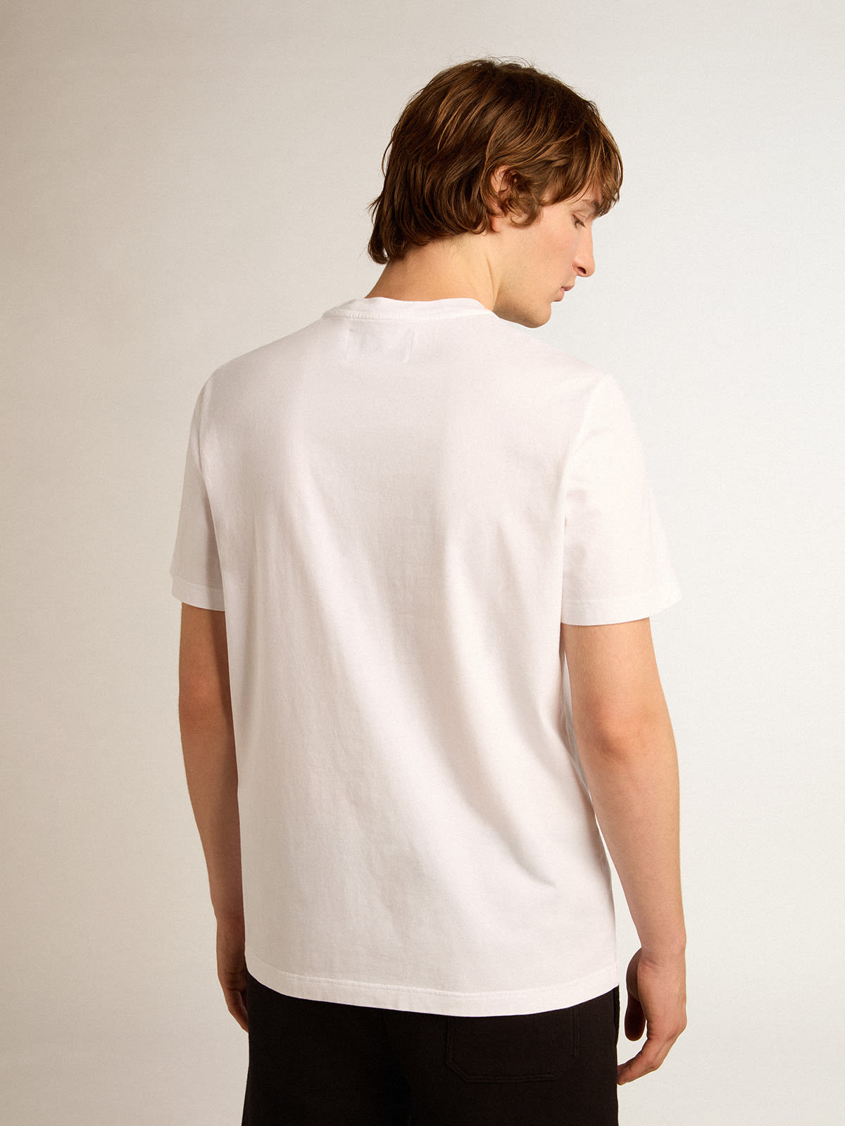 Men's white T-shirt with silver glitter star on the front