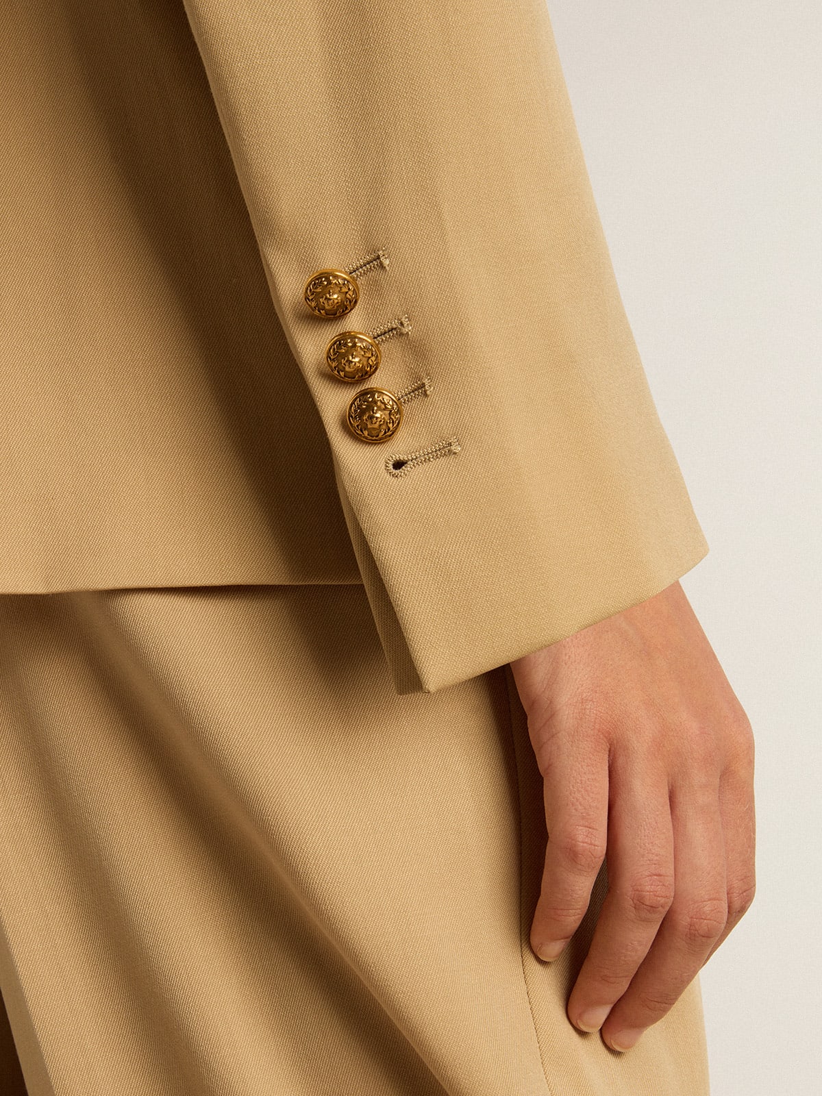 Women's double-breasted blazer in sand with gold heraldic buttons