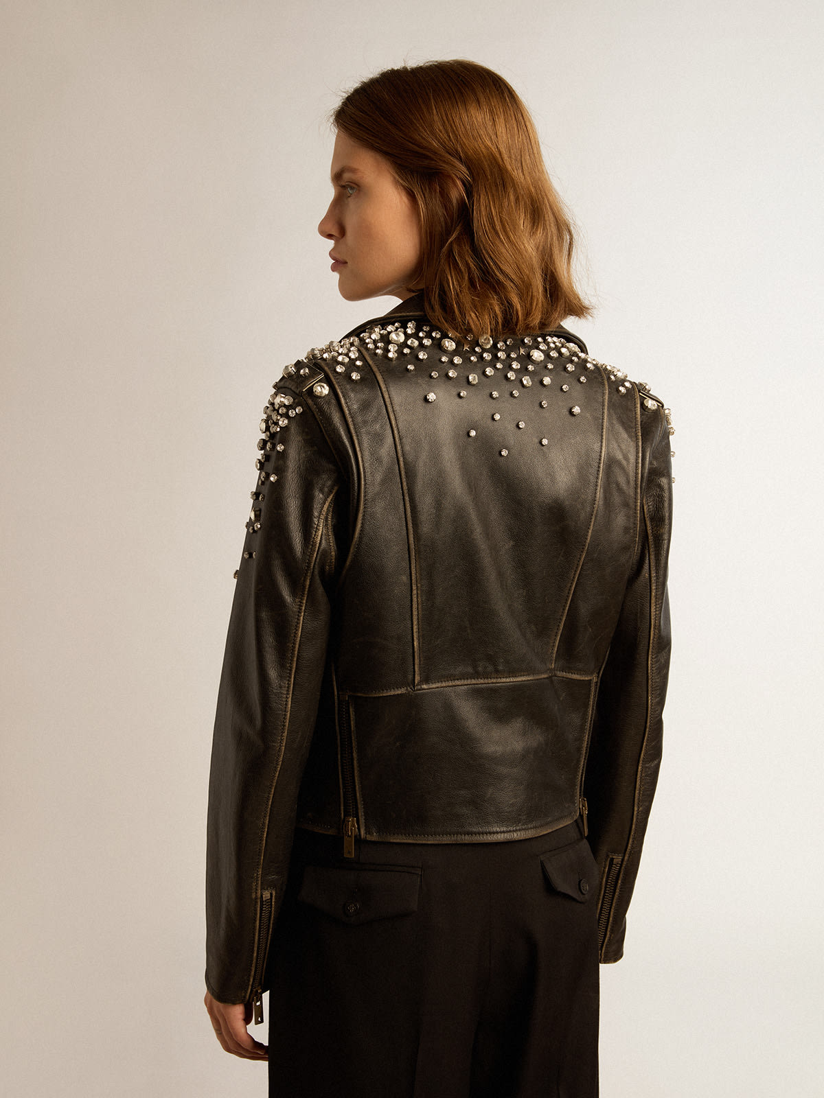 Golden Goose - Women's biker jacket in distressed leather with cabochon crystals in 